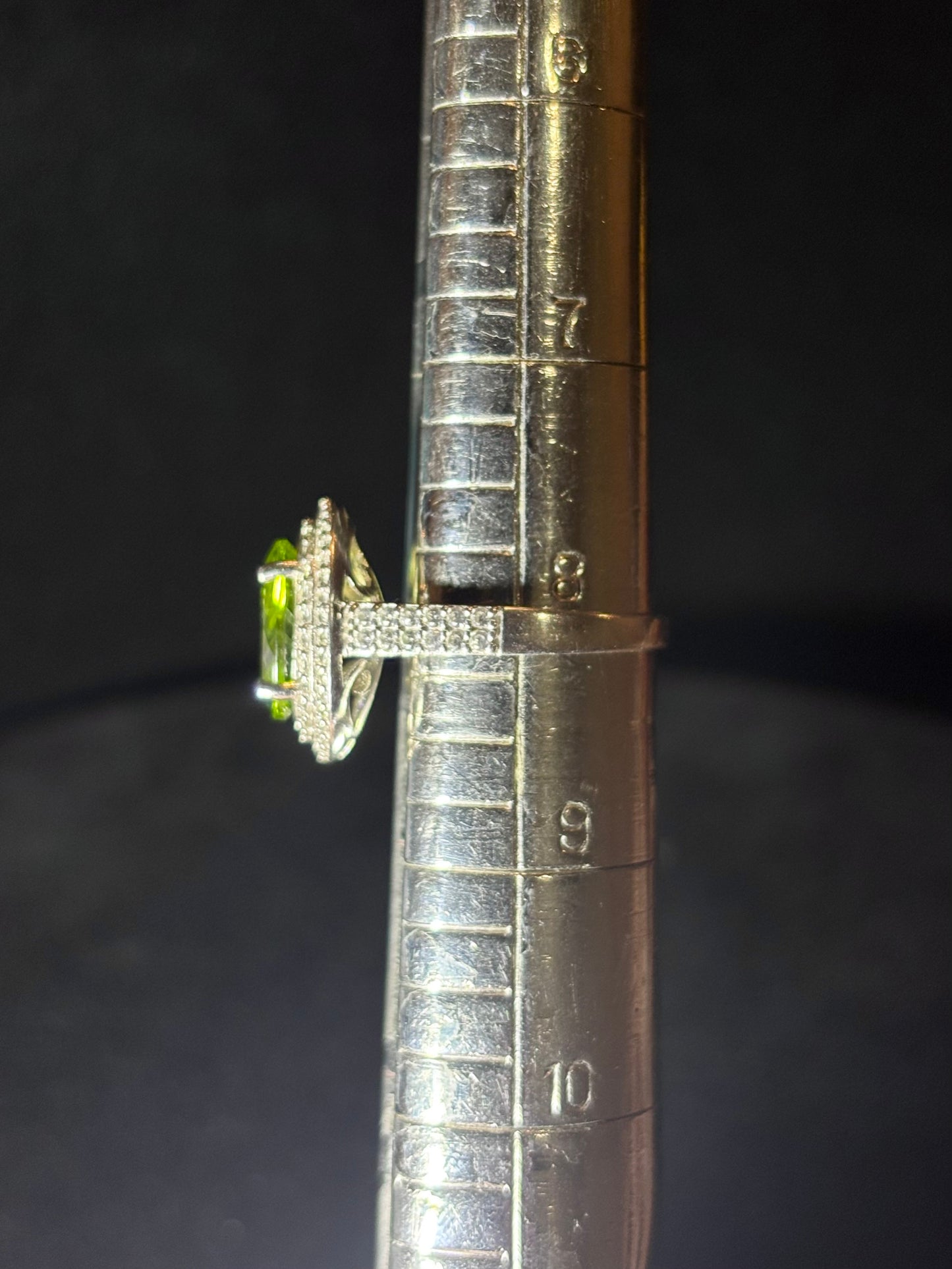 Oval Peridot in Double Halo Ring