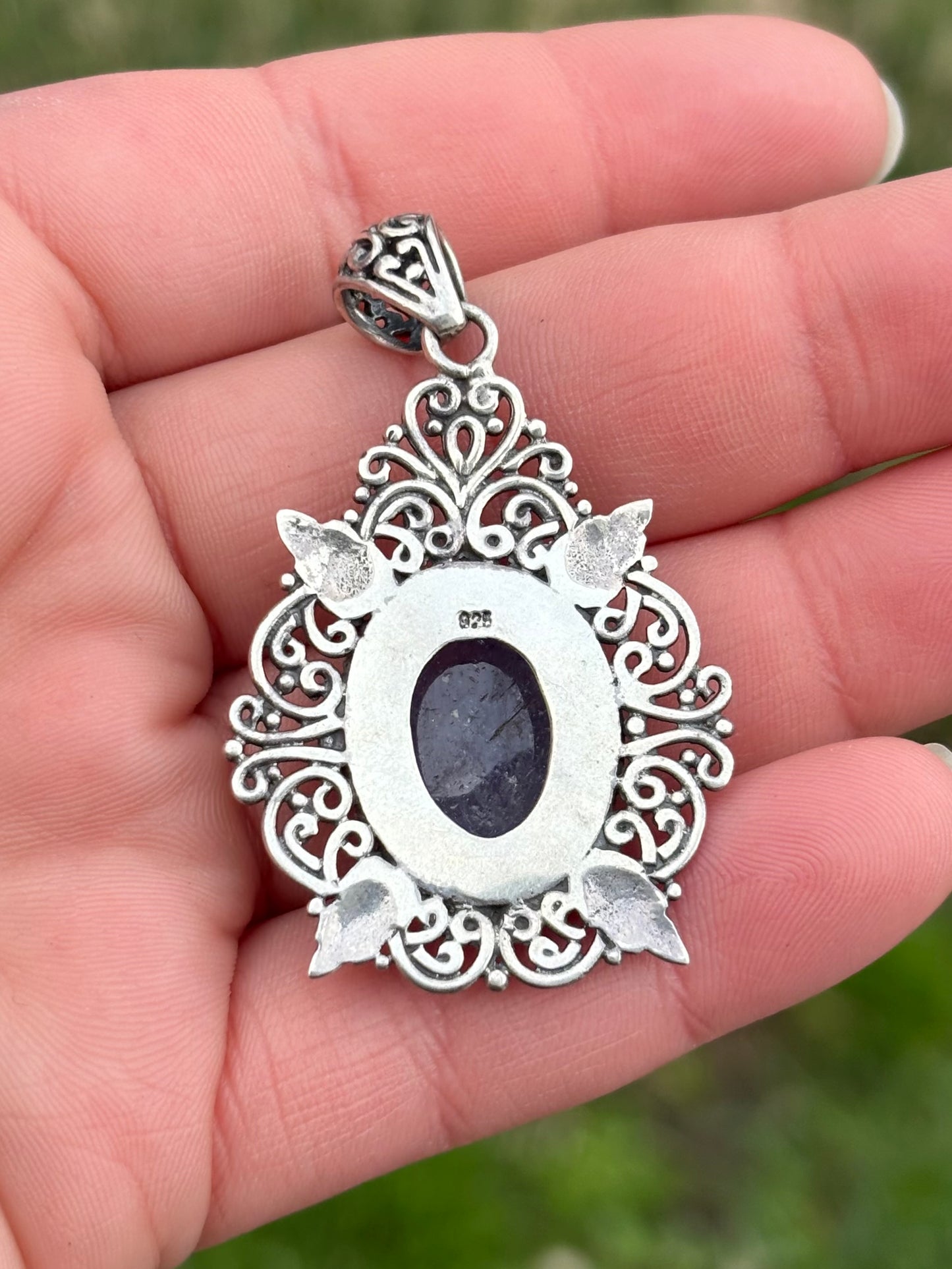 Carved Tanzanite in Elaborate Filigree Setting Pendant