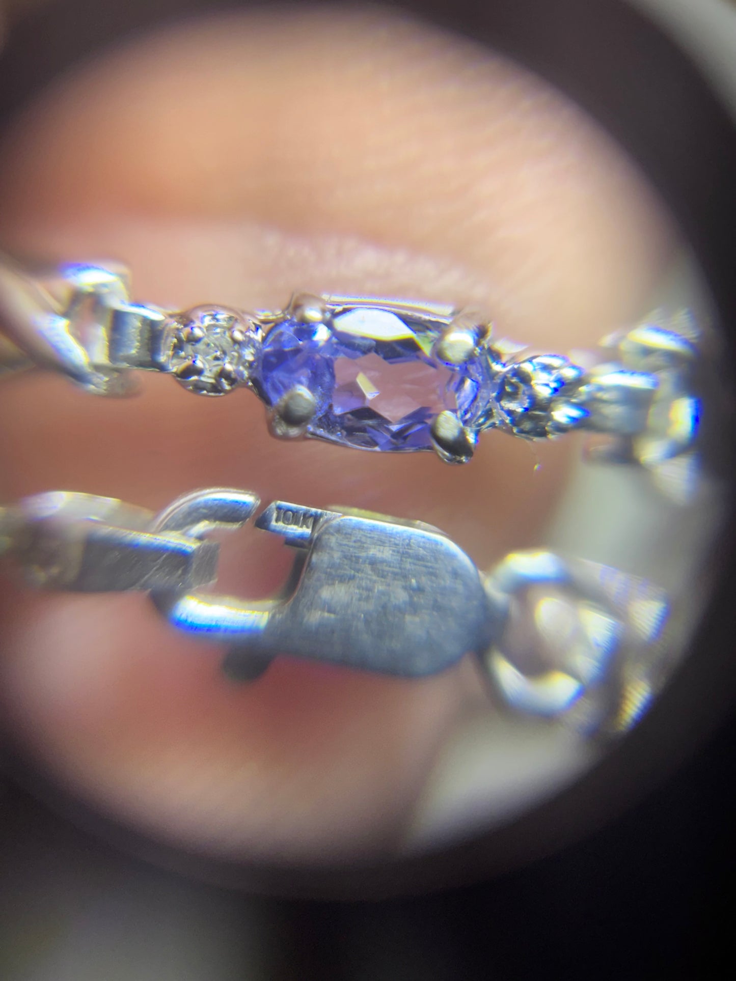 10K White Gold Oval Cut Tanzanite Tennis Bracelet with Diamond Accent