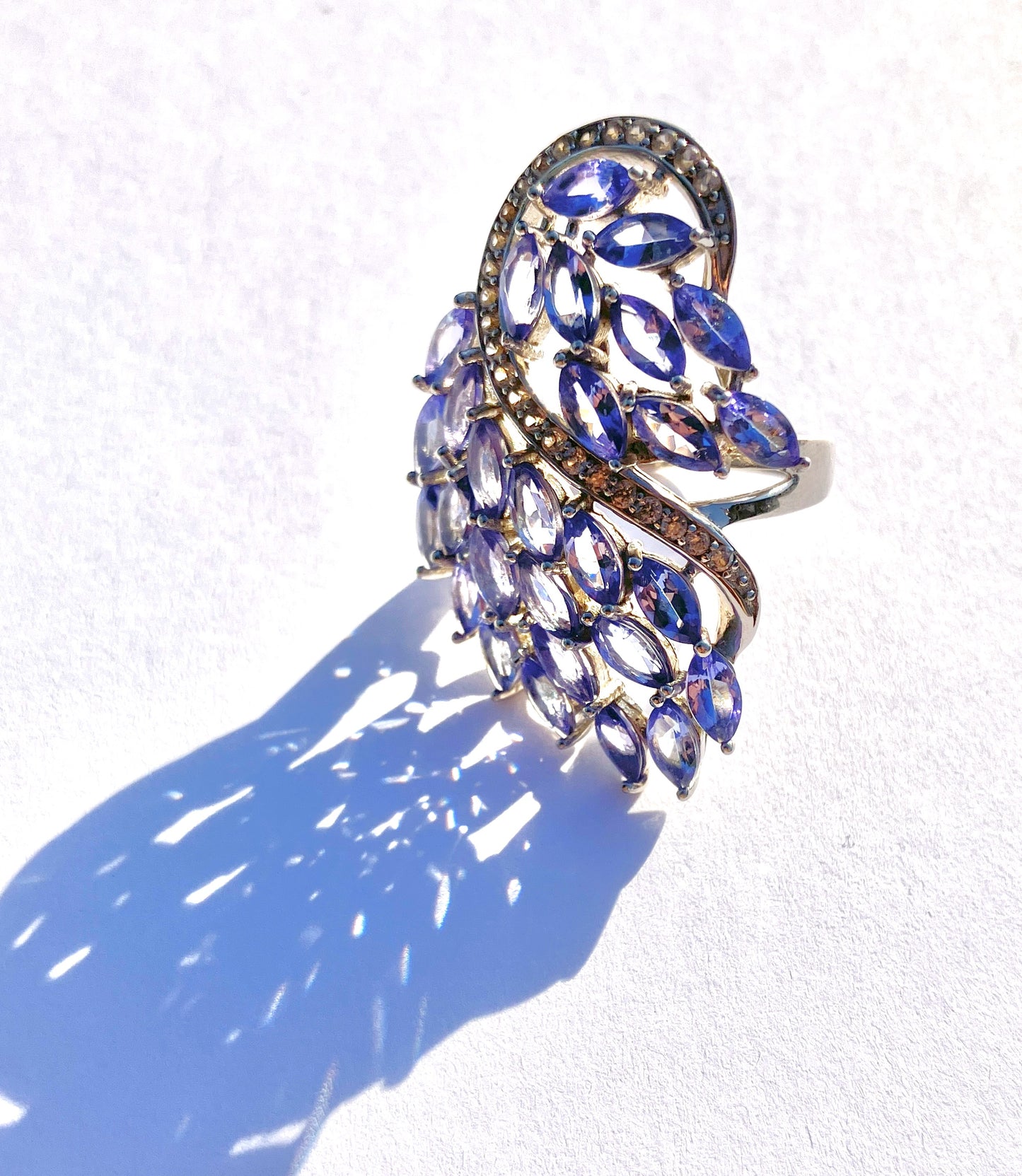 Marquise Cut Tanzanite Peacock Ring with Channel Set Zircon Accents