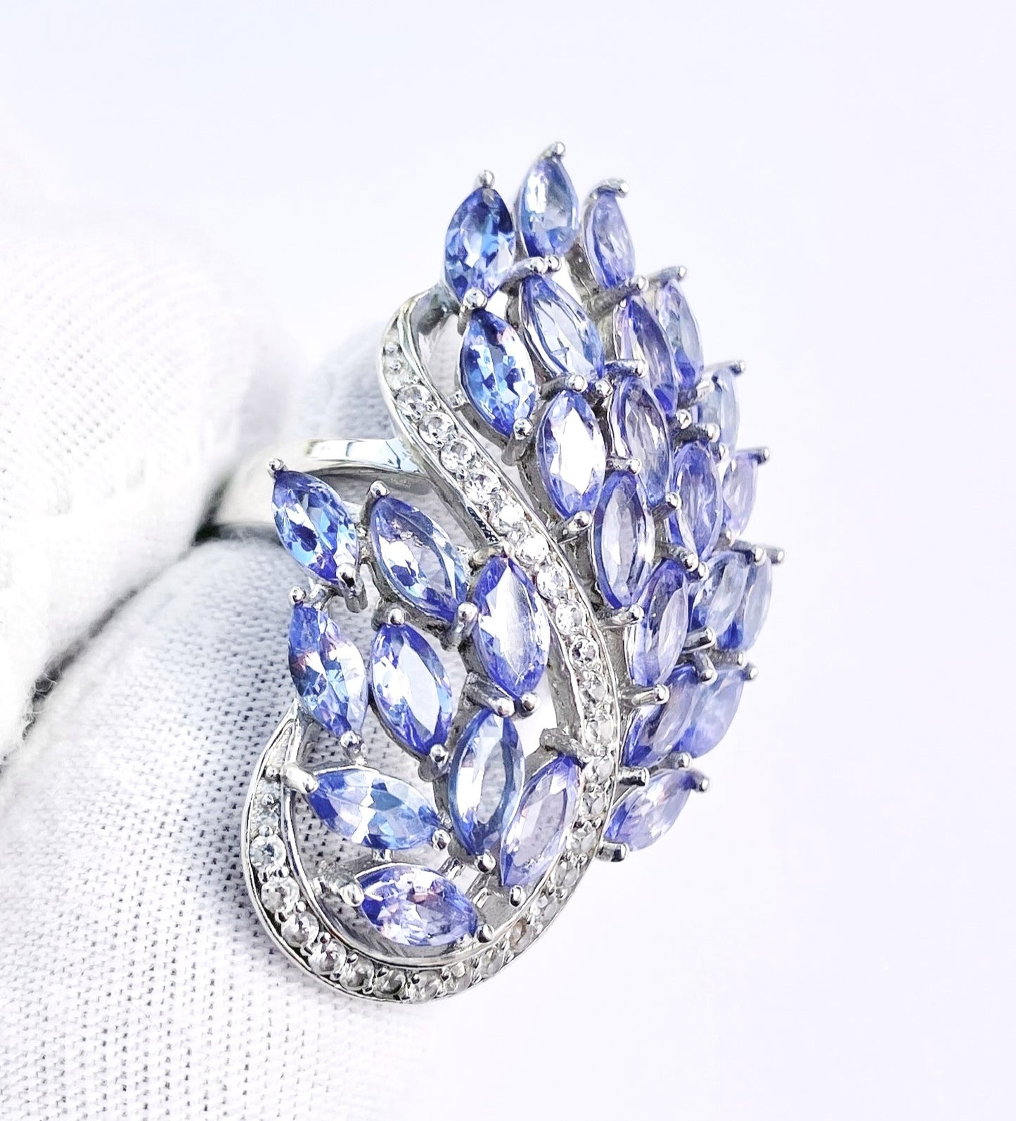 Marquise Cut Tanzanite Peacock Ring with Channel Set Zircon Accents