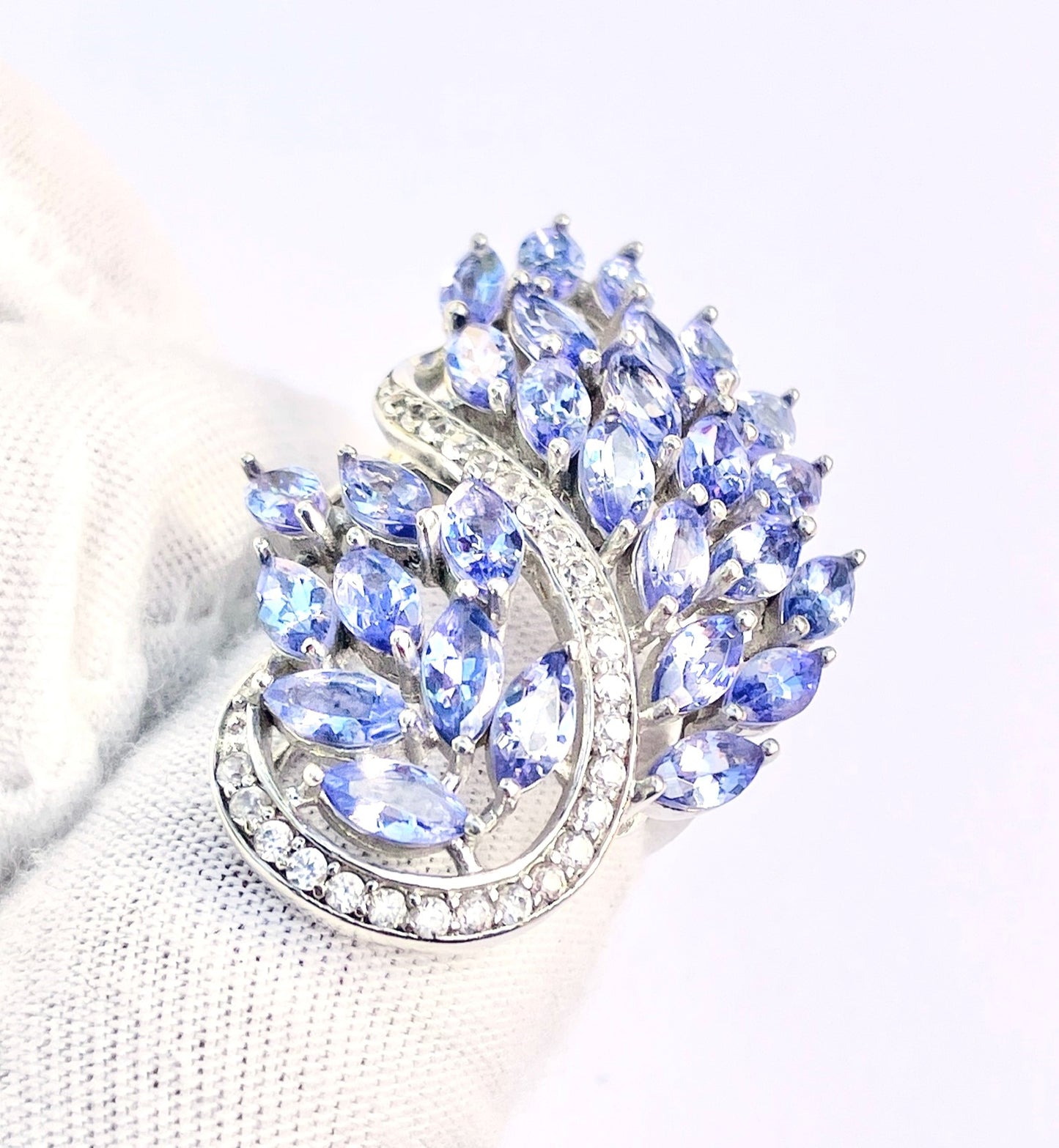 Marquise Cut Tanzanite Peacock Ring with Channel Set Zircon Accents