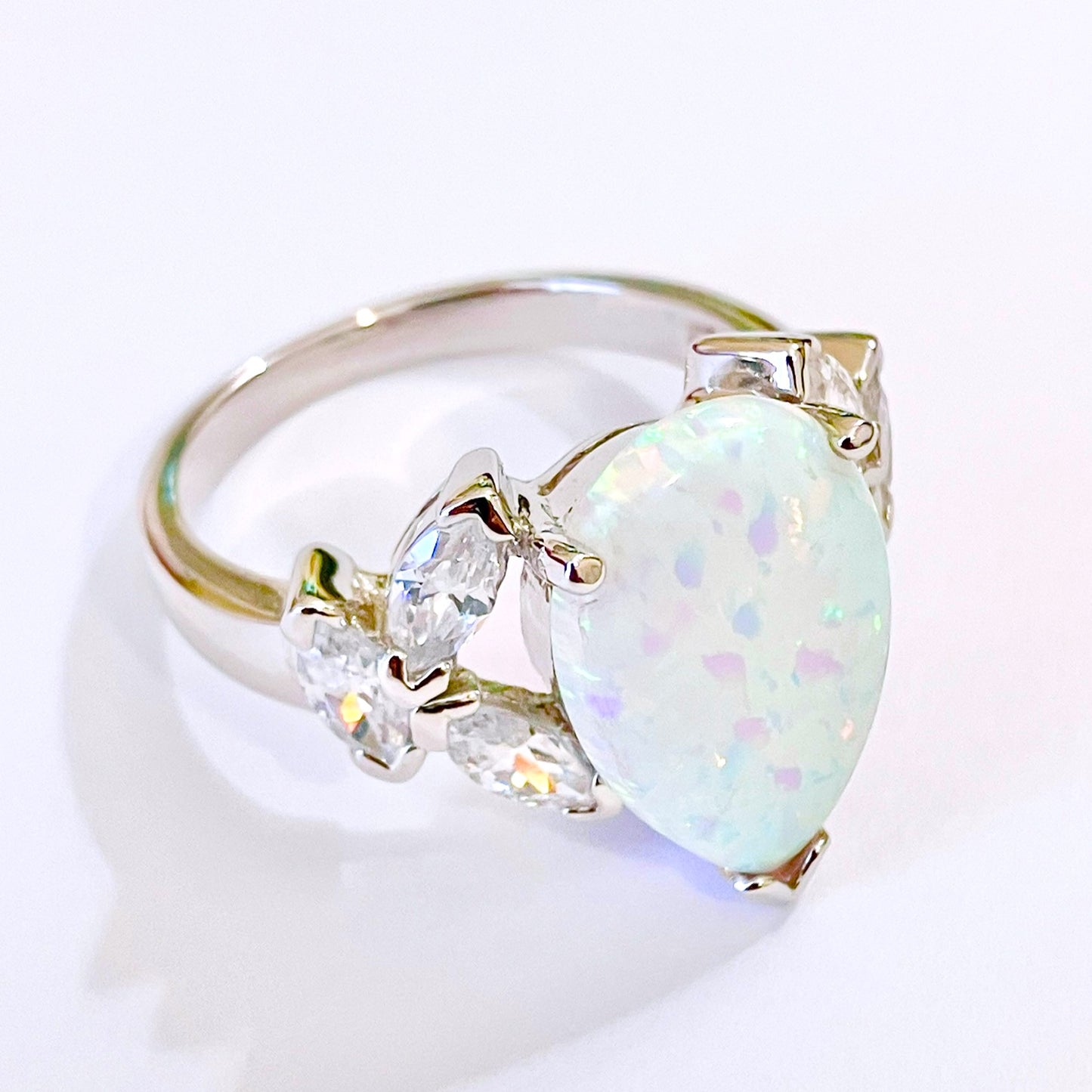 Pear Cut Synthetic Opal Ring with Marquise Cut “Diamond” Accents