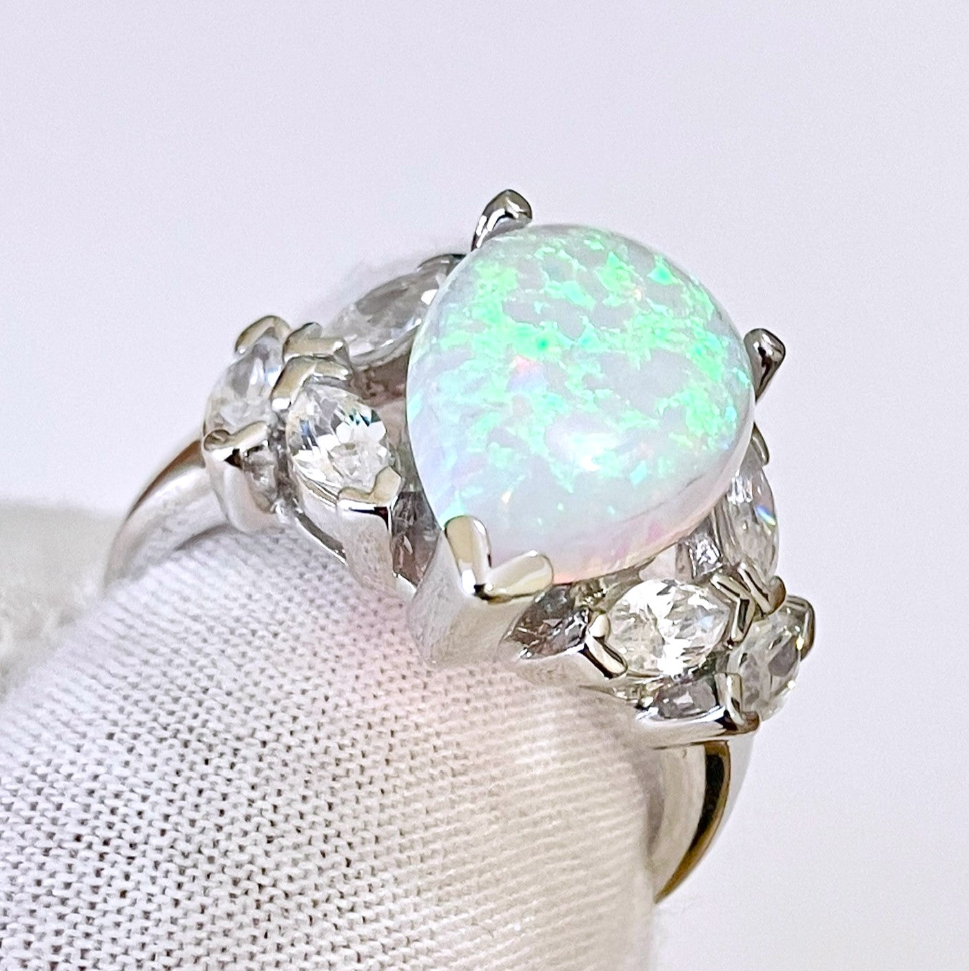 Pear Cut Synthetic Opal Ring with Marquise Cut “Diamond” Accents