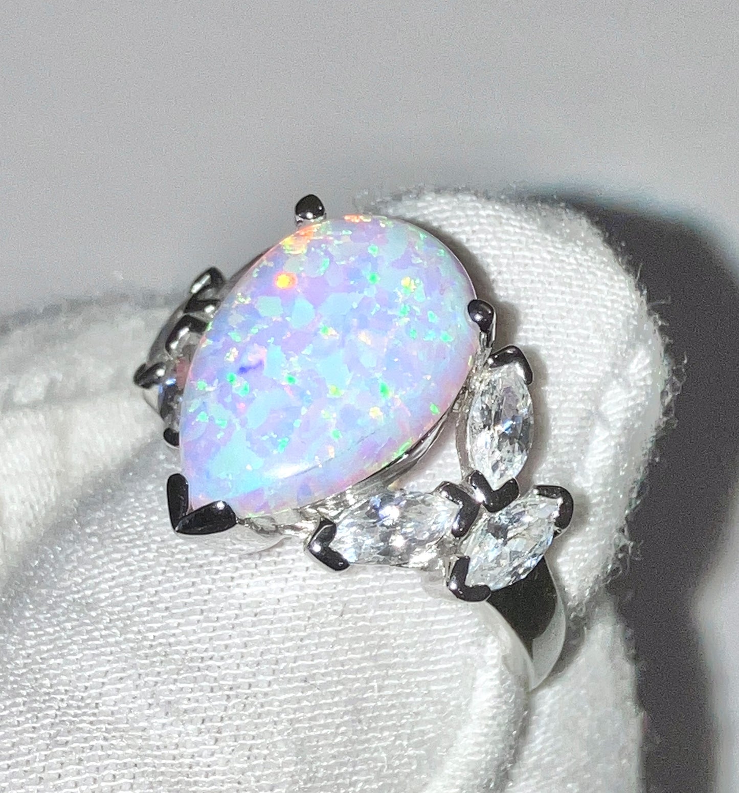 Pear Cut Synthetic Opal Ring with Marquise Cut “Diamond” Accents