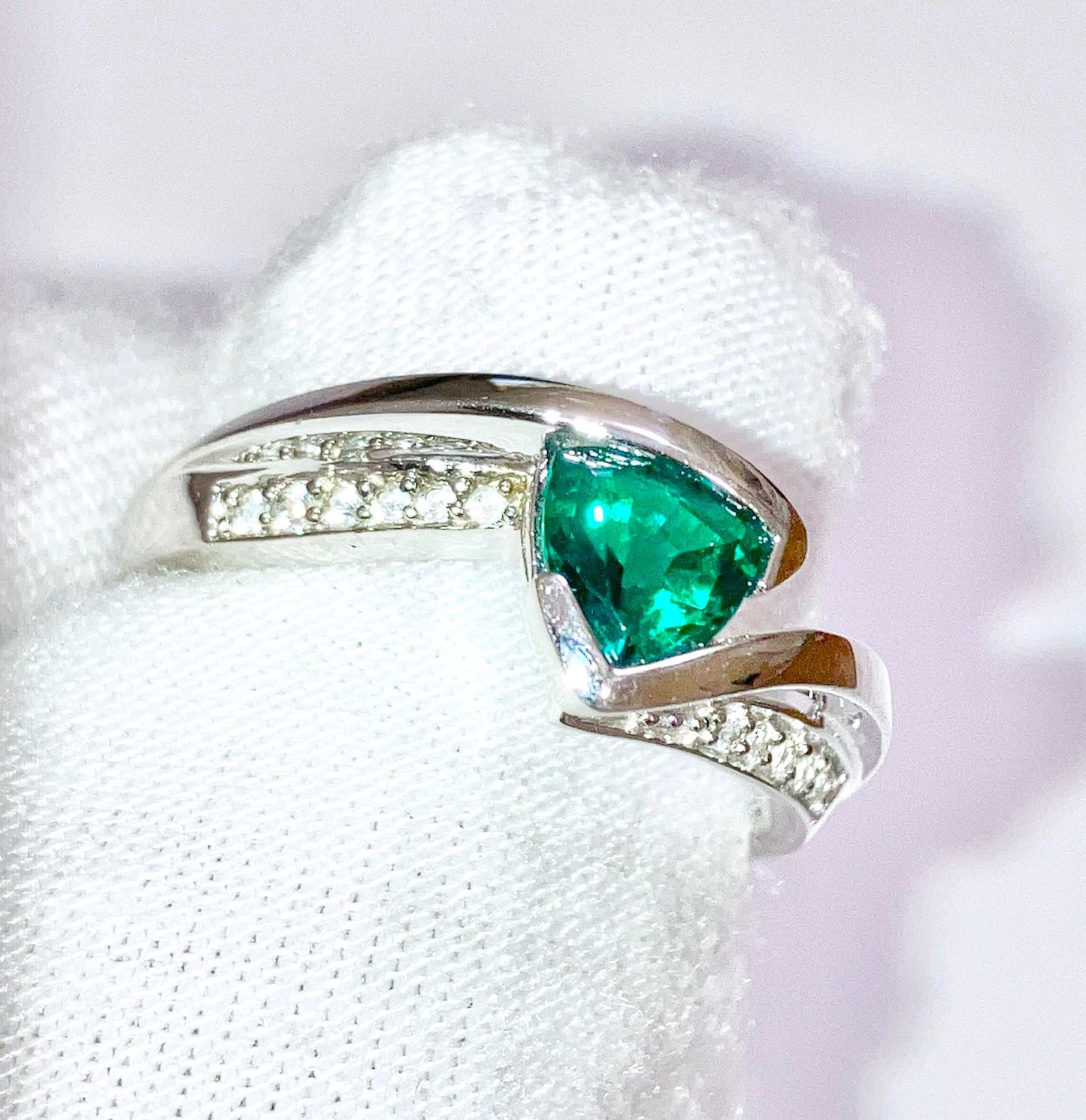 Triangular Brilliant Cut “Emerald” in Curved Bypass Shank with “Diamond” Accents Ring