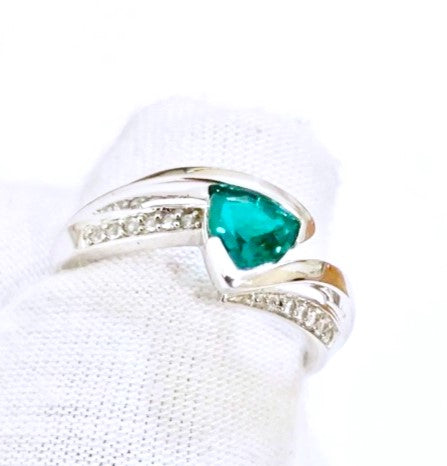 Triangular Brilliant Cut “Emerald” in Curved Bypass Shank with “Diamond” Accents Ring