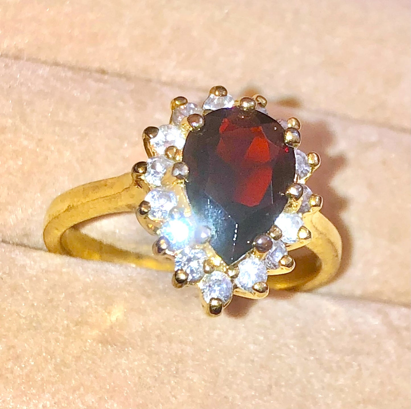 Gold Plated Pear Cut Garnet in "Diamond" Halo Ring