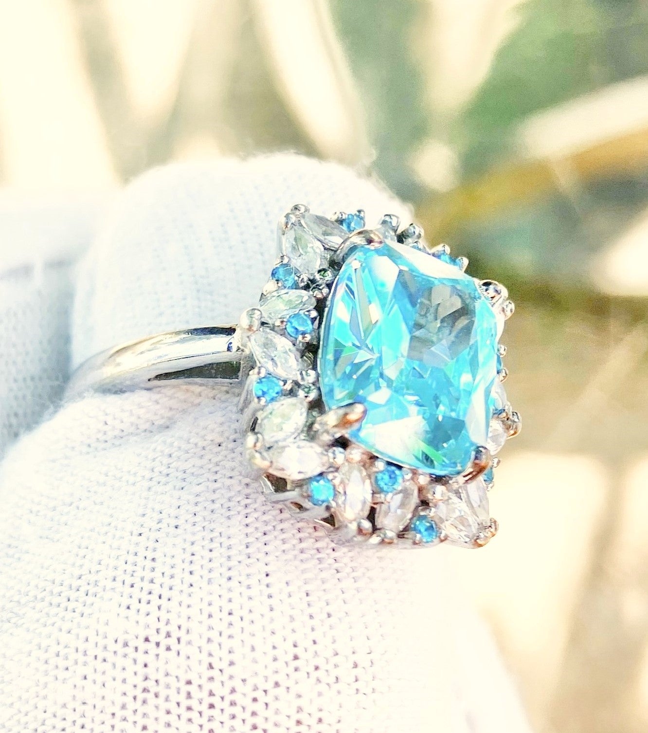 Elongated Cushion Cut “Aquamarine” in “Diamond” and “Aquamarine” Setting Ring