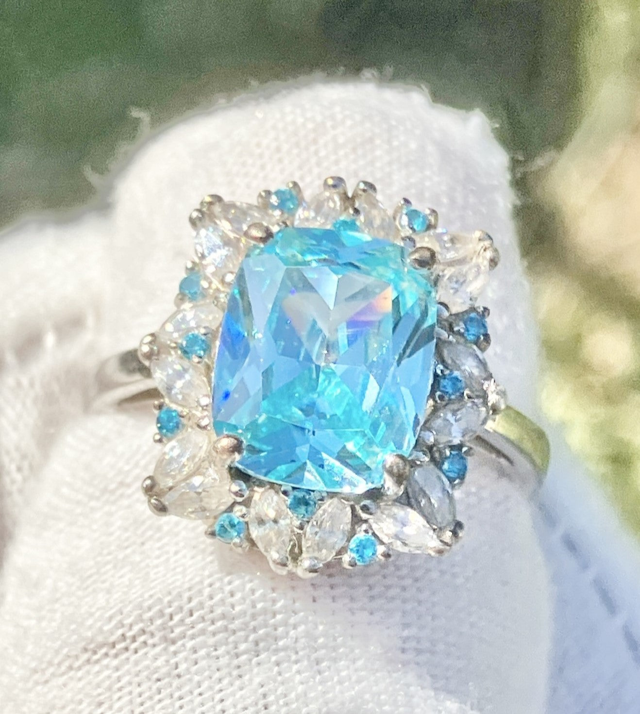 Elongated Cushion Cut “Aquamarine” in “Diamond” and “Aquamarine” Setting Ring