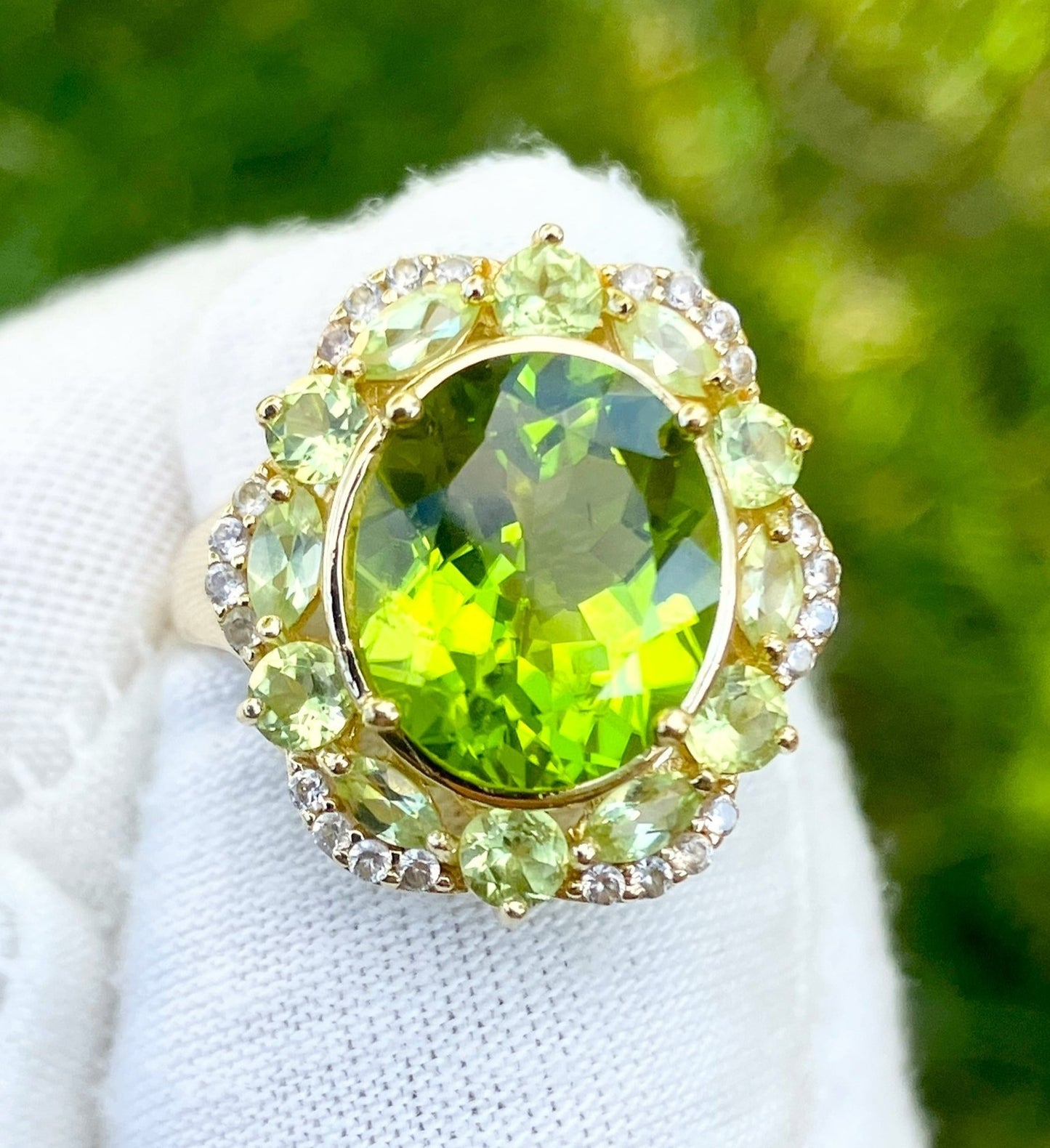 Gold Plated Oval Peridot in a Marquise and Round Cut Peridot Halo with “Diamond” Accents Ring