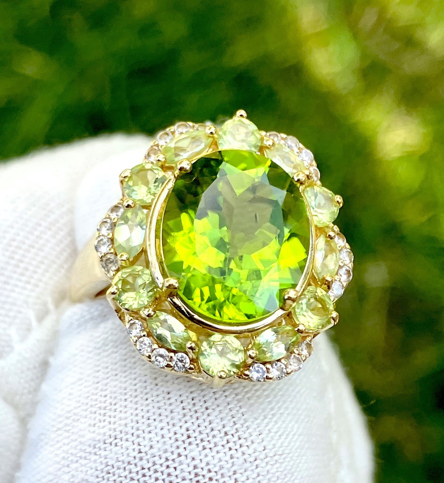 Gold Plated Oval Peridot in a Marquise and Round Cut Peridot Halo with “Diamond” Accents Ring