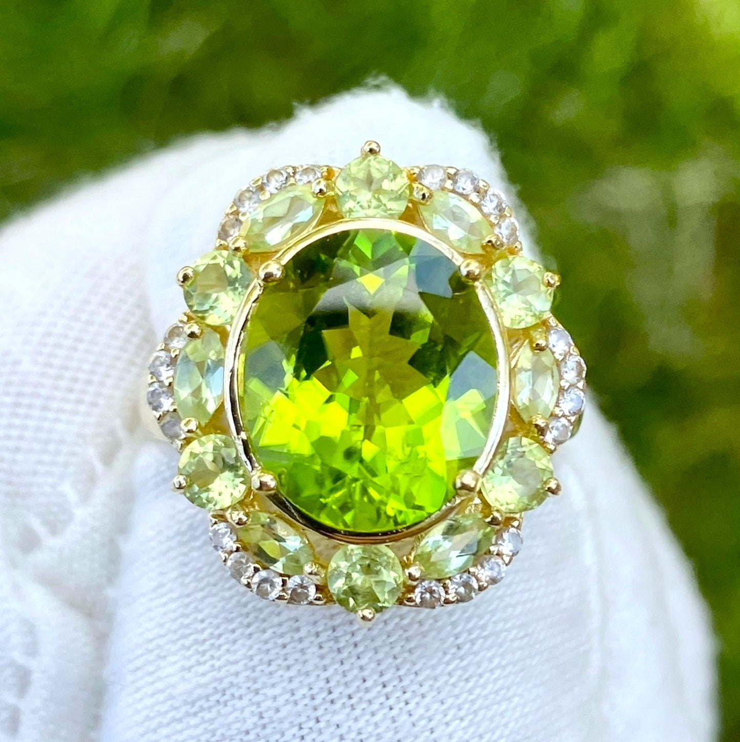 Gold Plated Oval Peridot in a Marquise and Round Cut Peridot Halo with “Diamond” Accents Ring