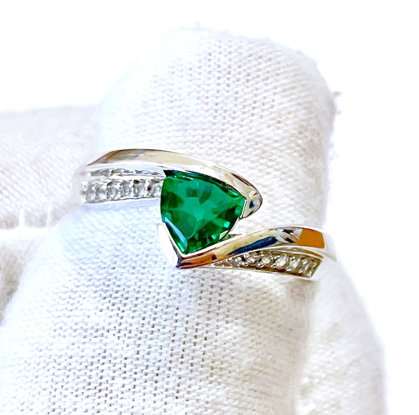 Triangular Brilliant Cut “Emerald” in Curved Bypass Shank with “Diamond” Accents Ring