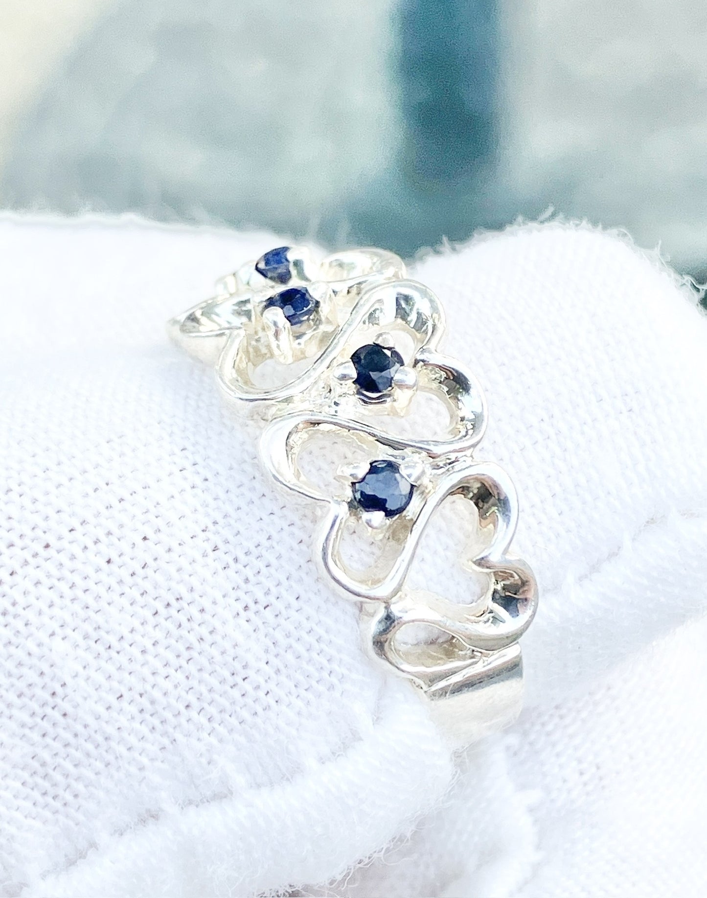 Intertwined Sapphire Studded Hearts Ring