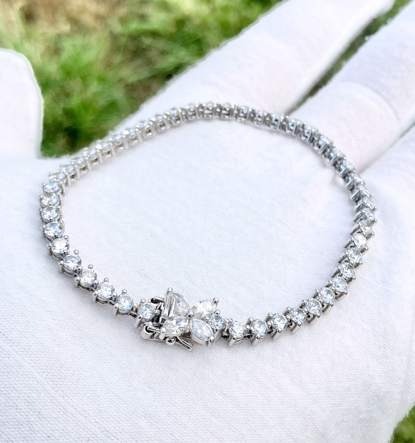 “Diamond” Tennis Bracelet with Marquise “Diamond” Floral Clasp