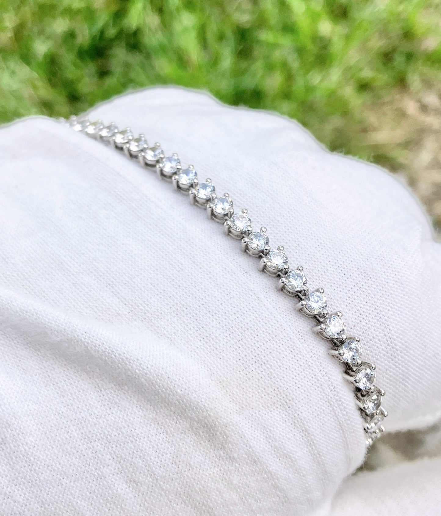 “Diamond” Tennis Bracelet with Marquise “Diamond” Floral Clasp