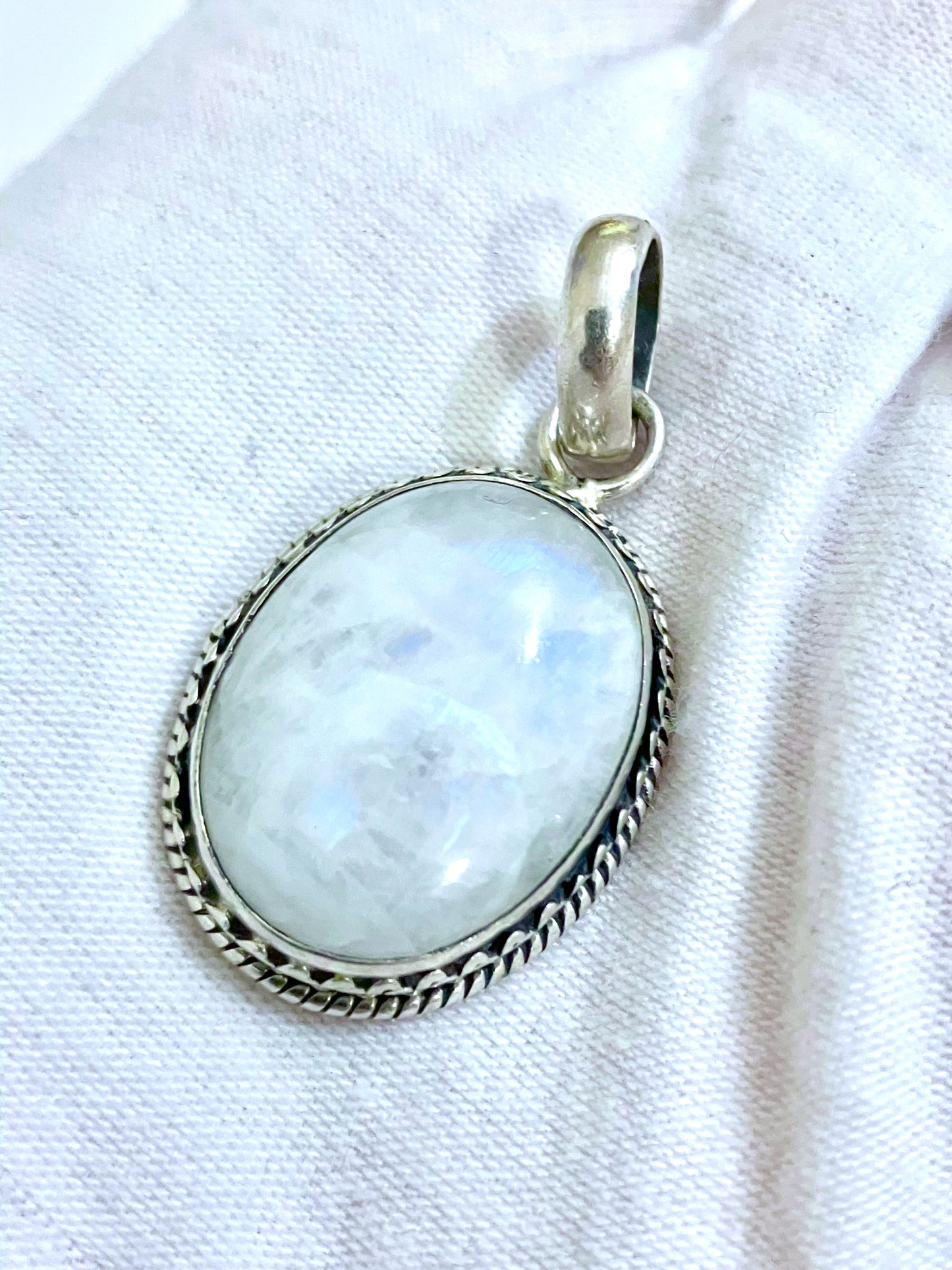 Oval Moonstone in Engraved Setting Pendant