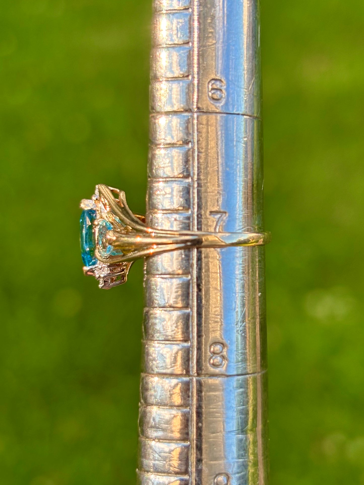 10K Swiss Blue Topaz with Diamond Accents Ring