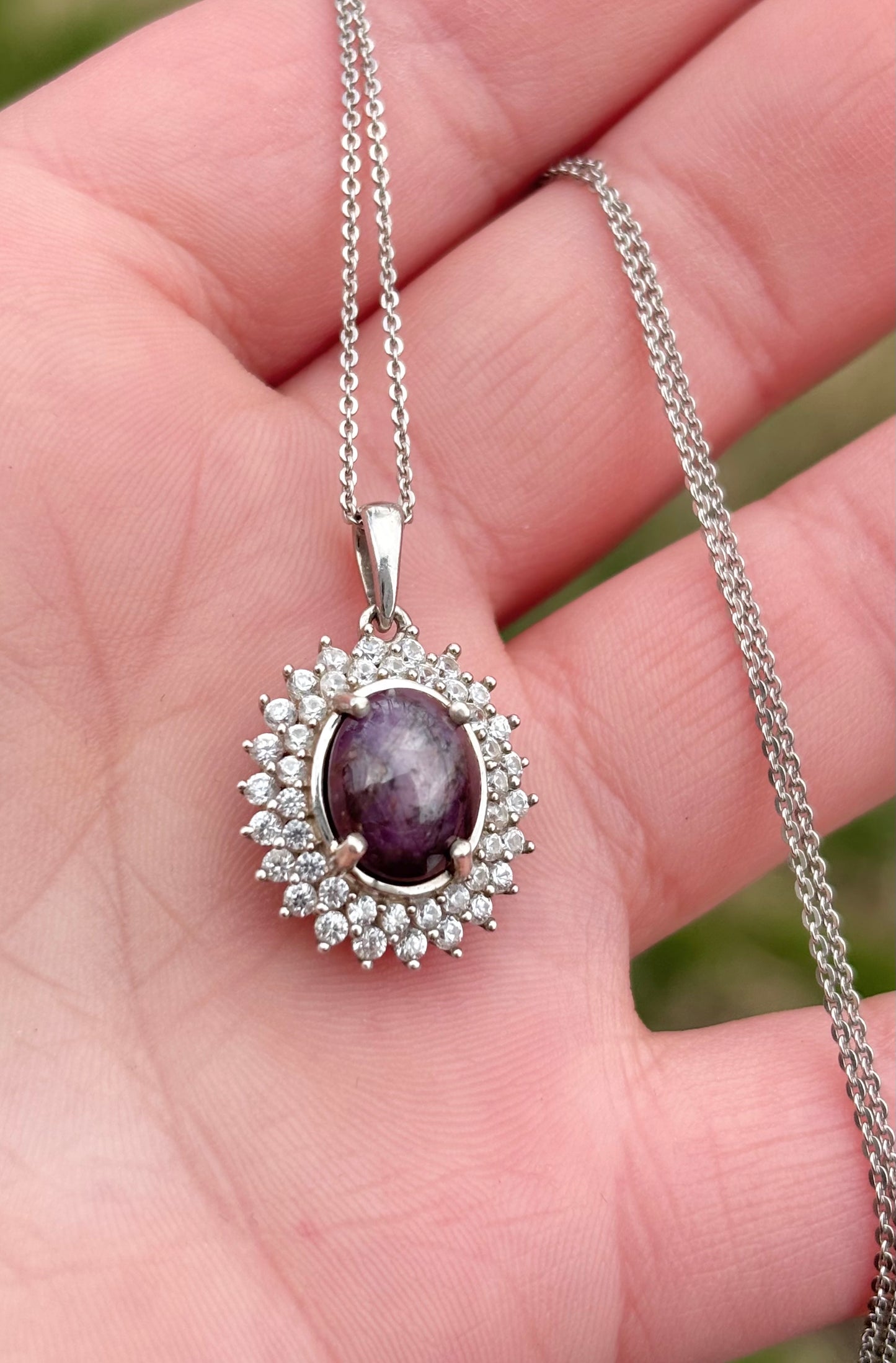 Oval Star Ruby in Halo Necklace
