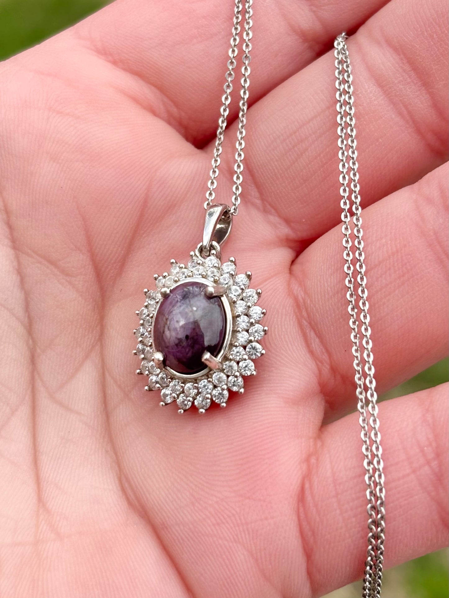Oval Star Ruby in Halo Necklace