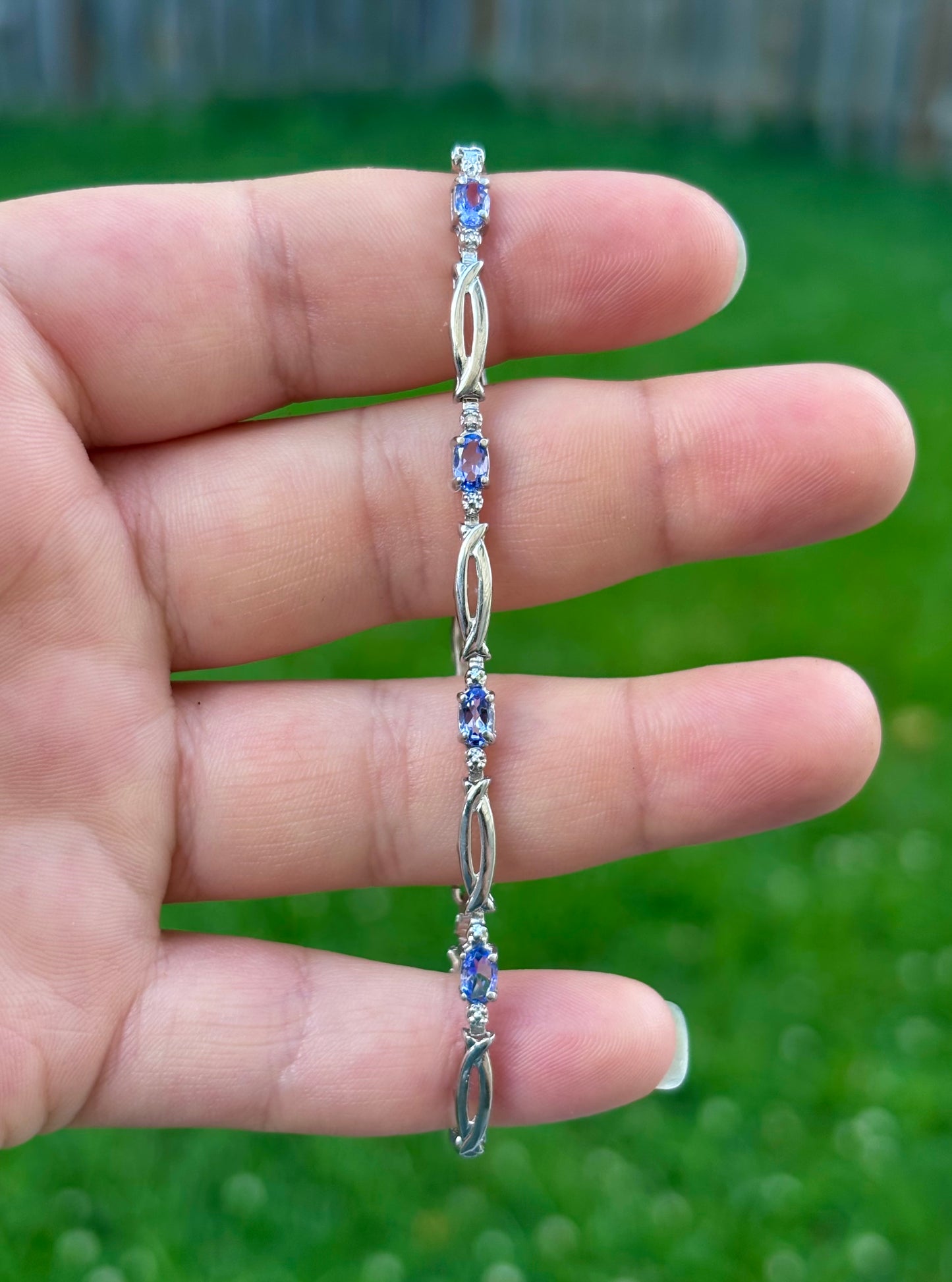 10K White Gold Oval Cut Tanzanite Tennis Bracelet with Diamond Accent