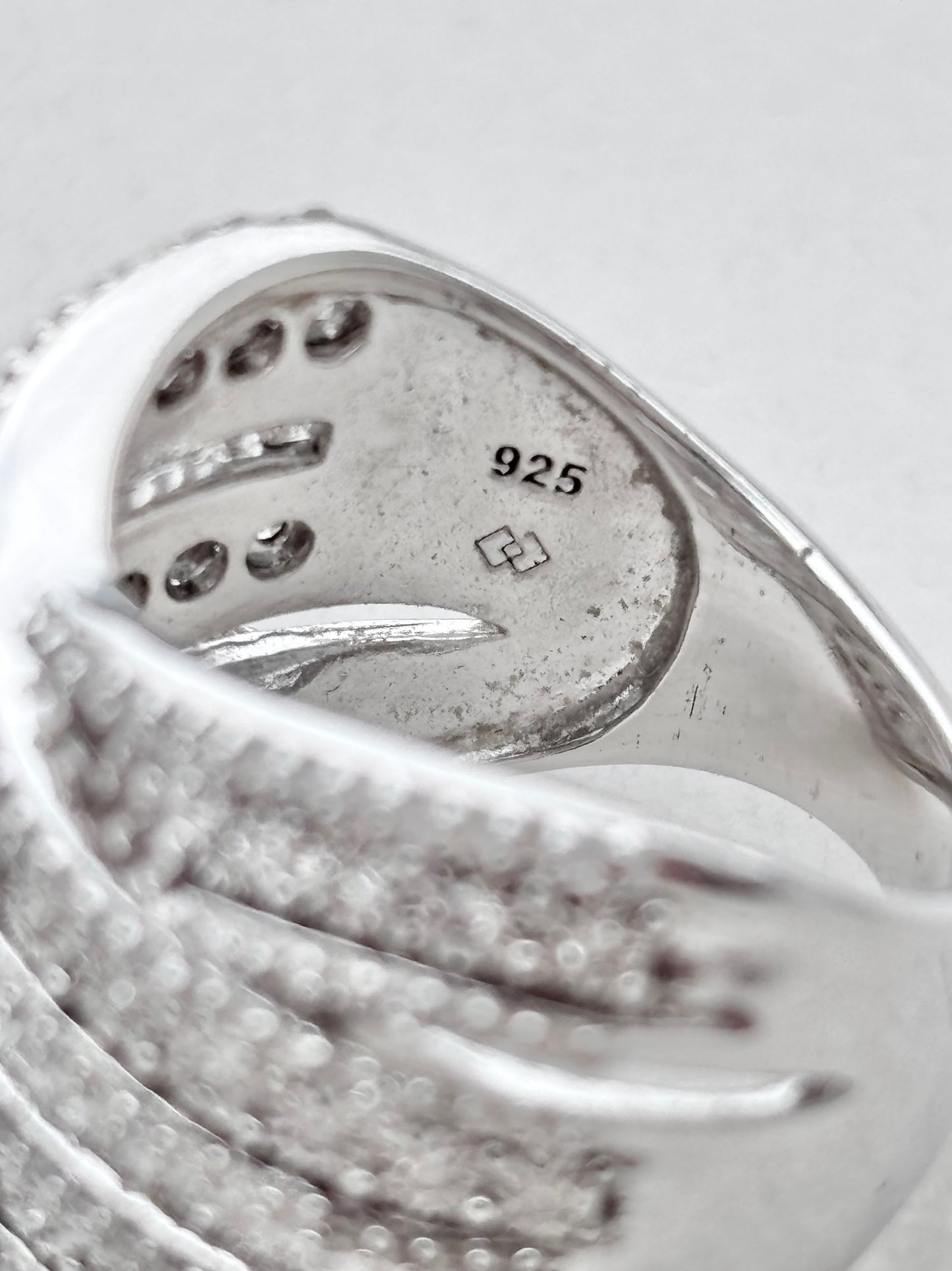 Crisscross Baguette and Round Diamond Ring