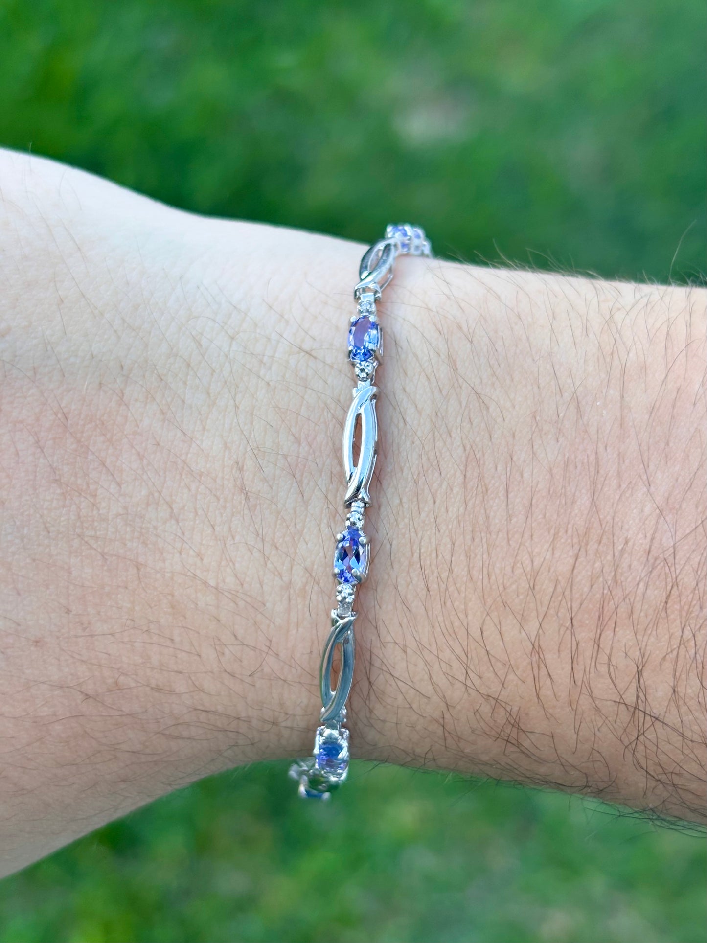 10K White Gold Oval Cut Tanzanite Tennis Bracelet with Diamond Accent