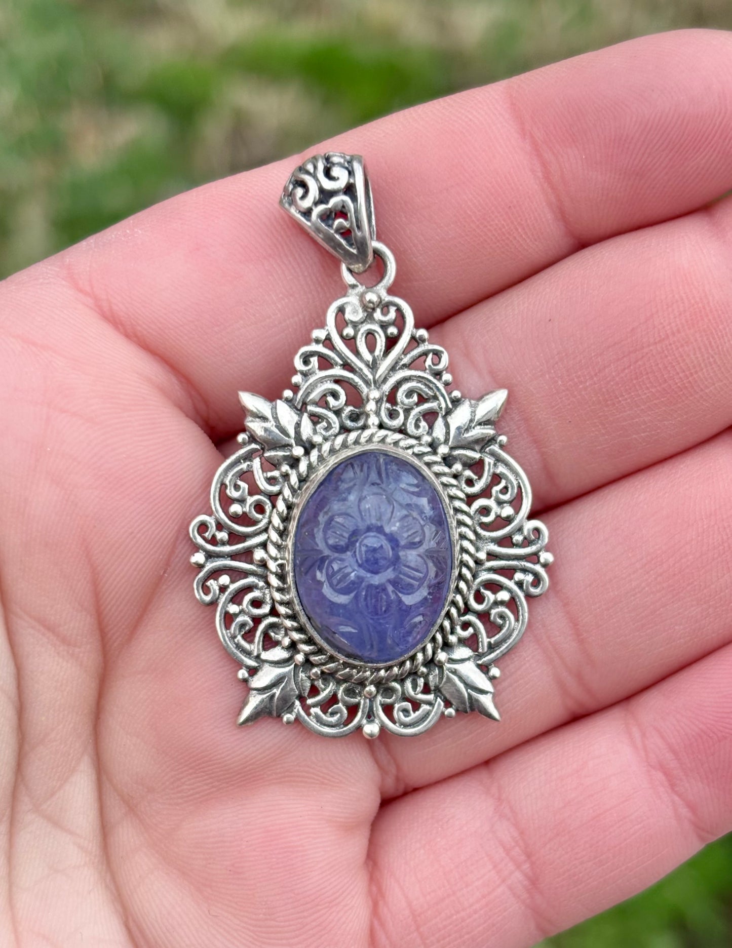 Carved Tanzanite in Elaborate Filigree Setting Pendant