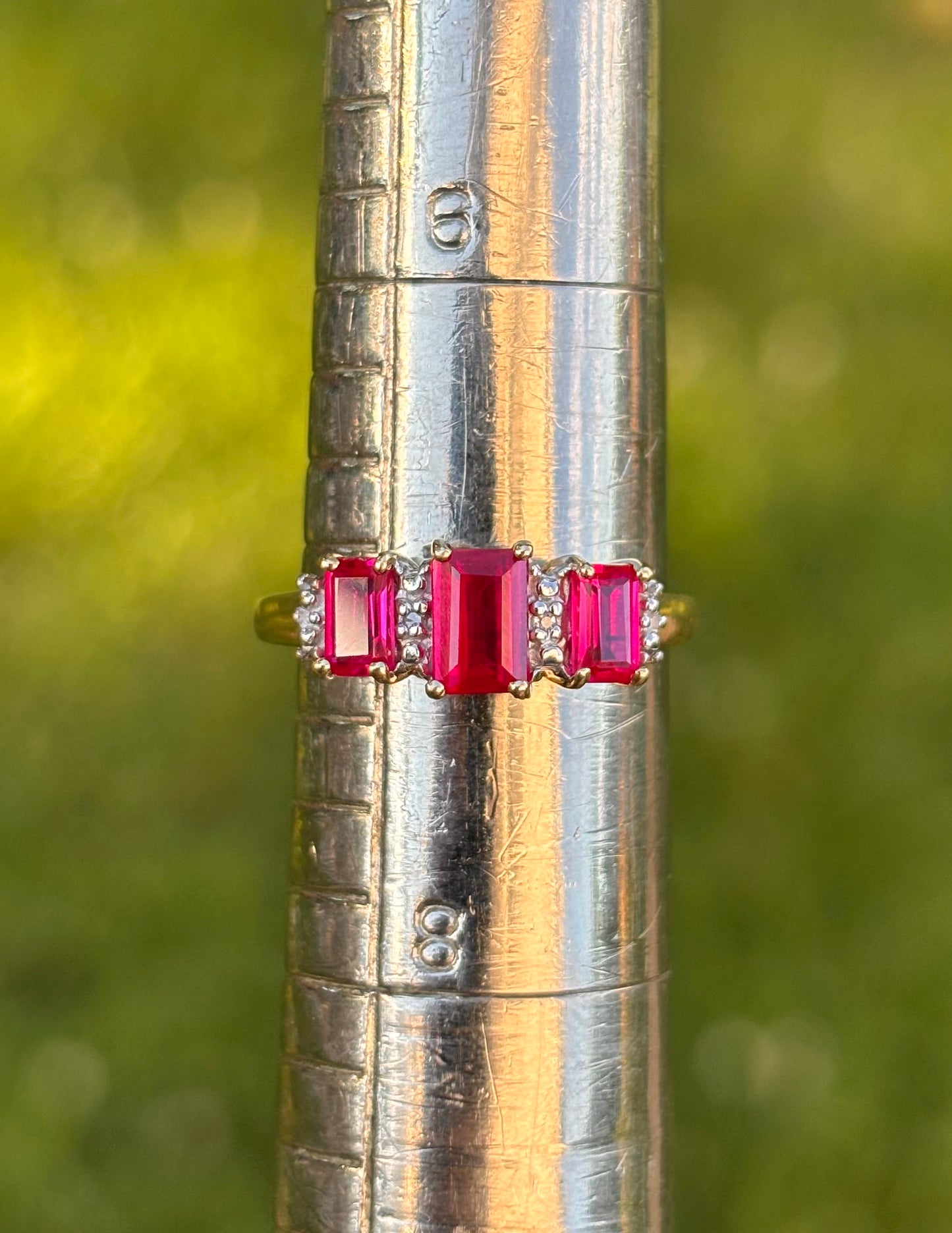 10k Emerald Cut Lab Rubies with Natural Diamond Accents Ring