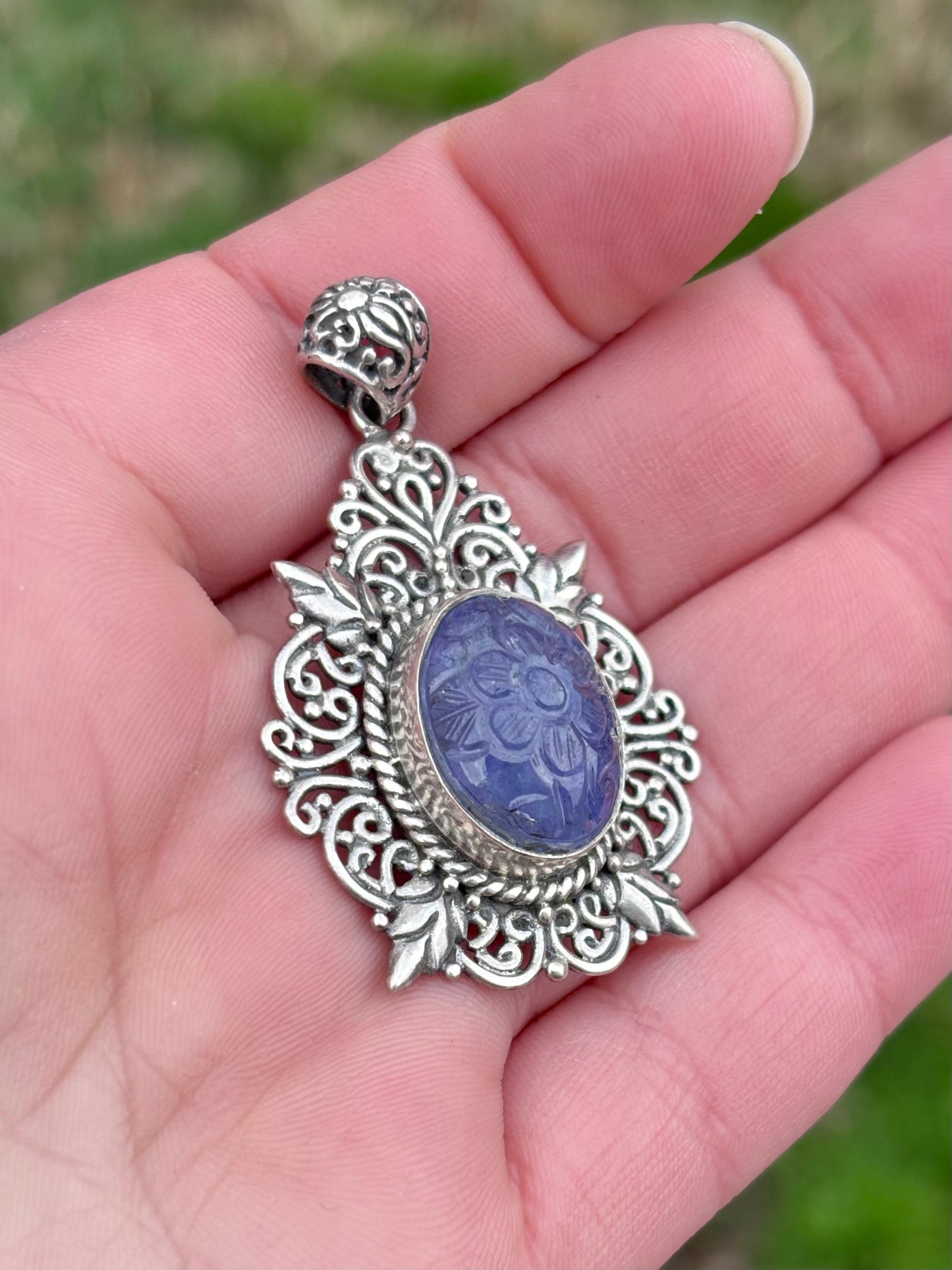 Carved Tanzanite in Elaborate Filigree Setting Pendant