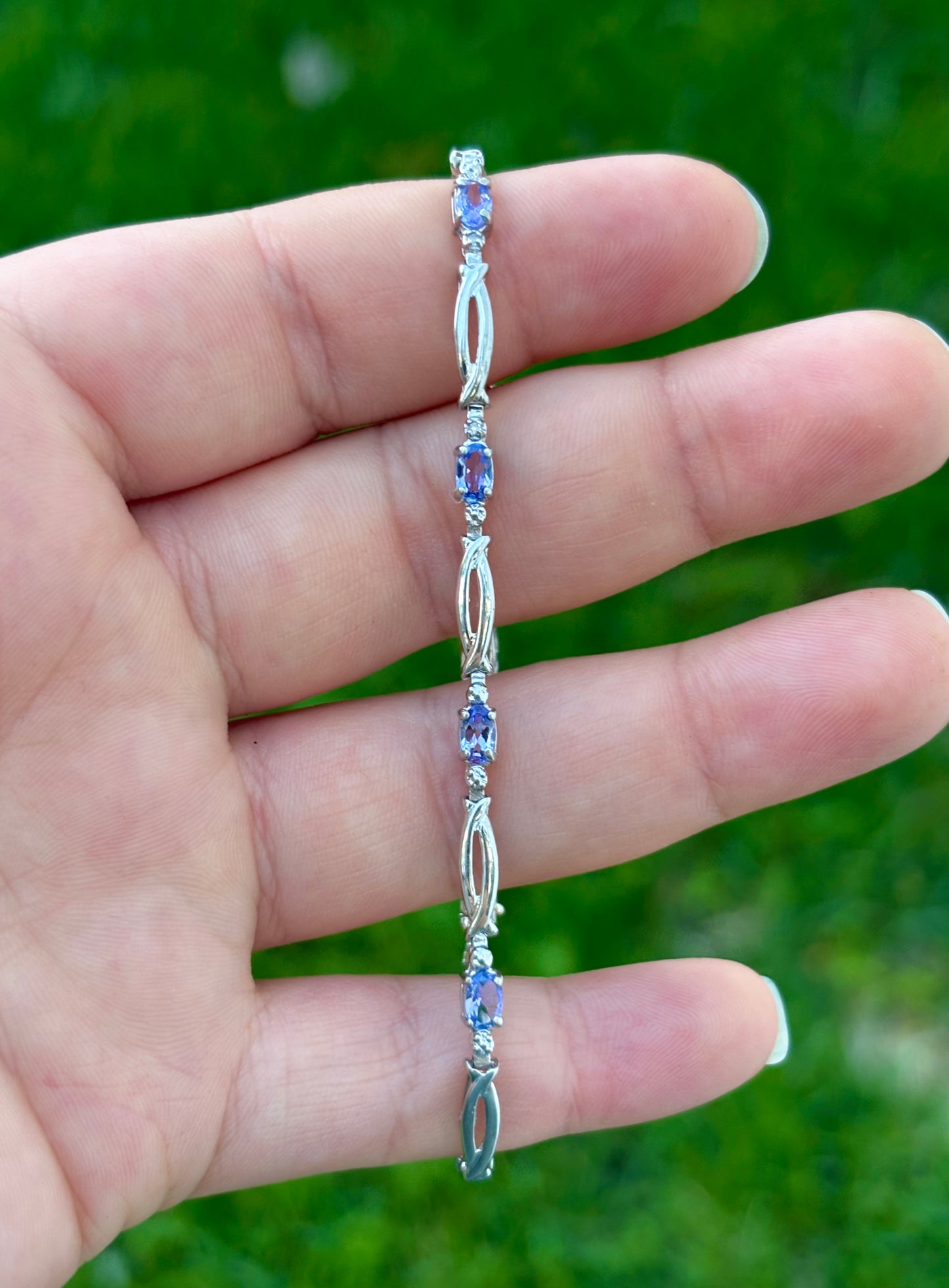 10K White Gold Oval Cut Tanzanite Tennis Bracelet with Diamond Accent