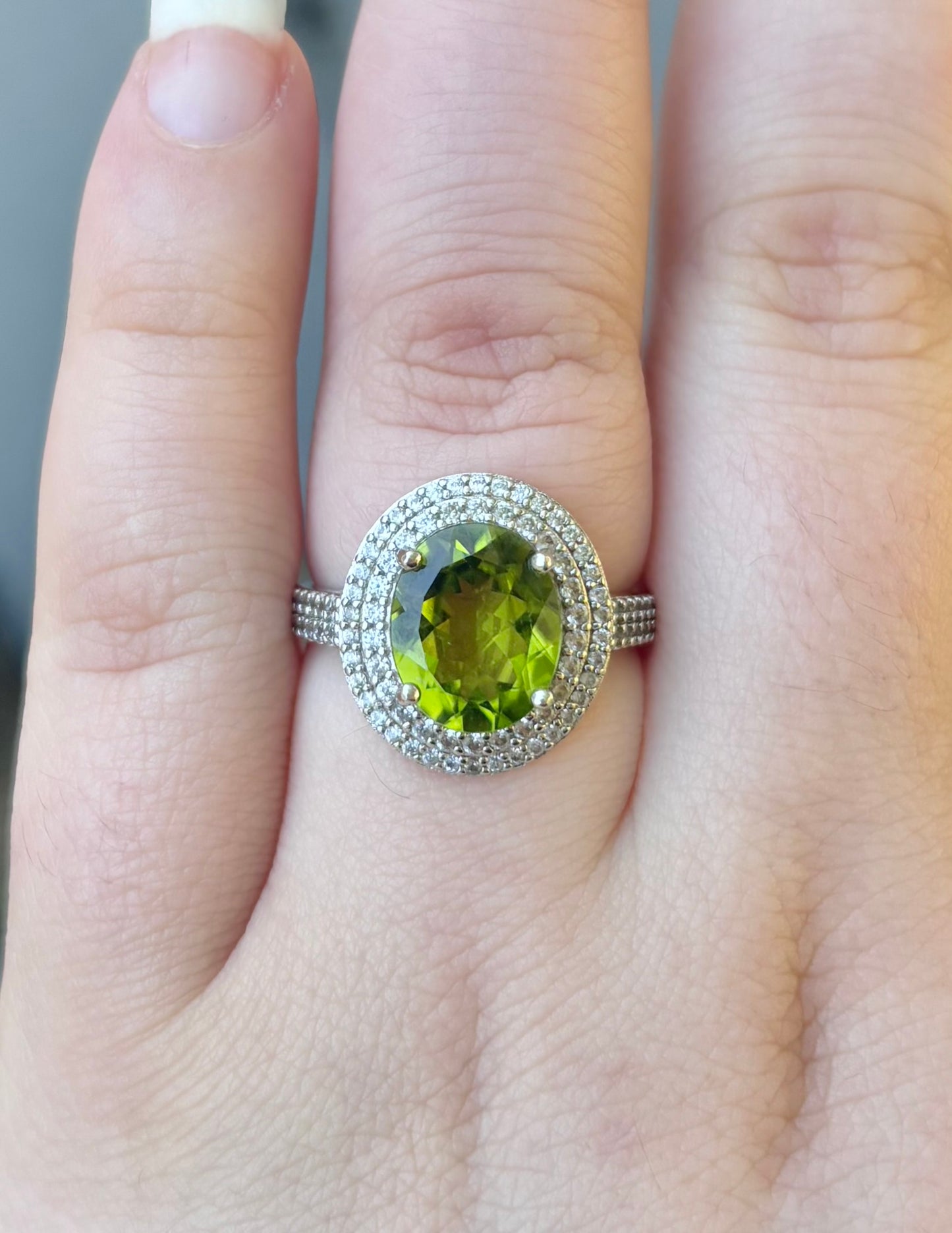 Oval Peridot in Double Halo Ring