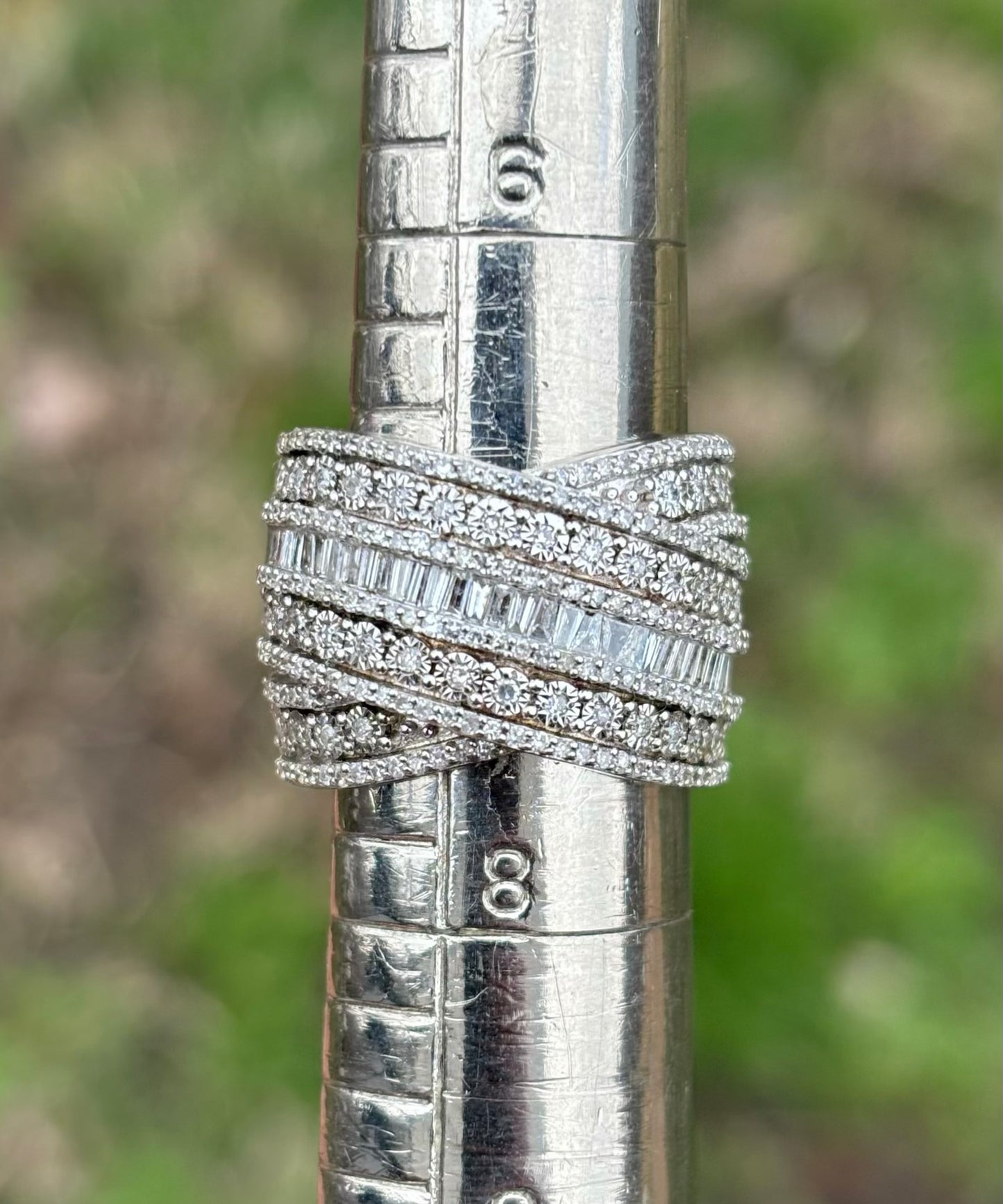 Crisscross Baguette and Round Diamond Ring