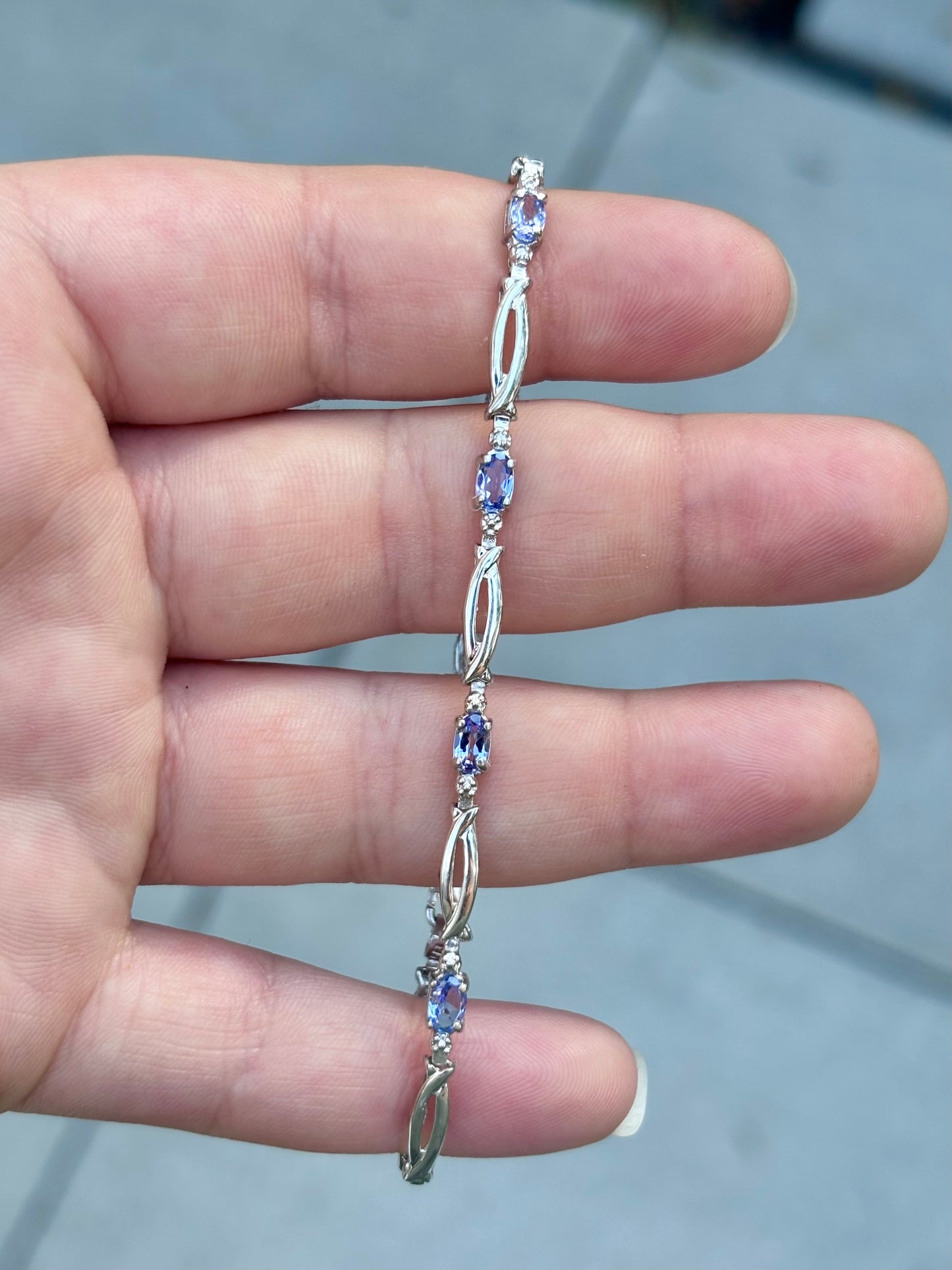 10K White Gold Oval Cut Tanzanite Tennis Bracelet with Diamond Accent