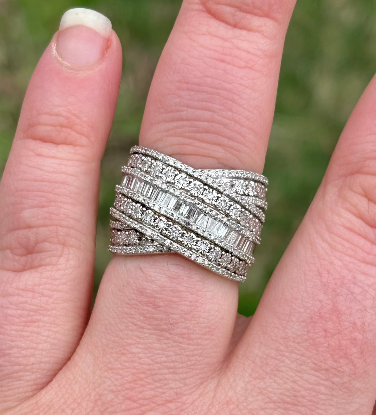 Crisscross Baguette and Round Diamond Ring