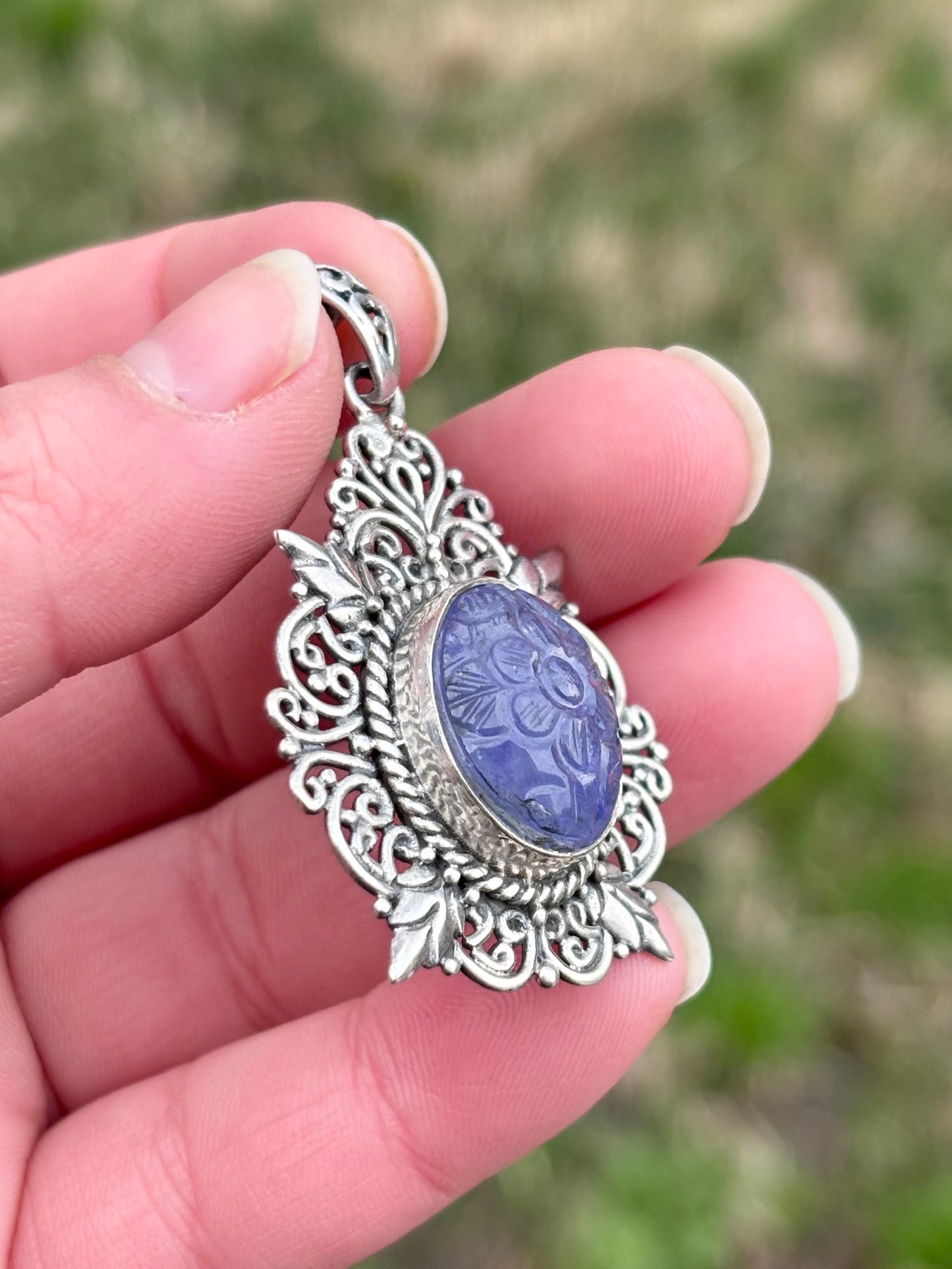 Carved Tanzanite in Elaborate Filigree Setting Pendant