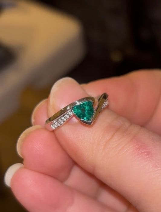 Triangular Brilliant Cut Lab Emerald in Curved Bypass Shank with “Diamond” Accents Ring
