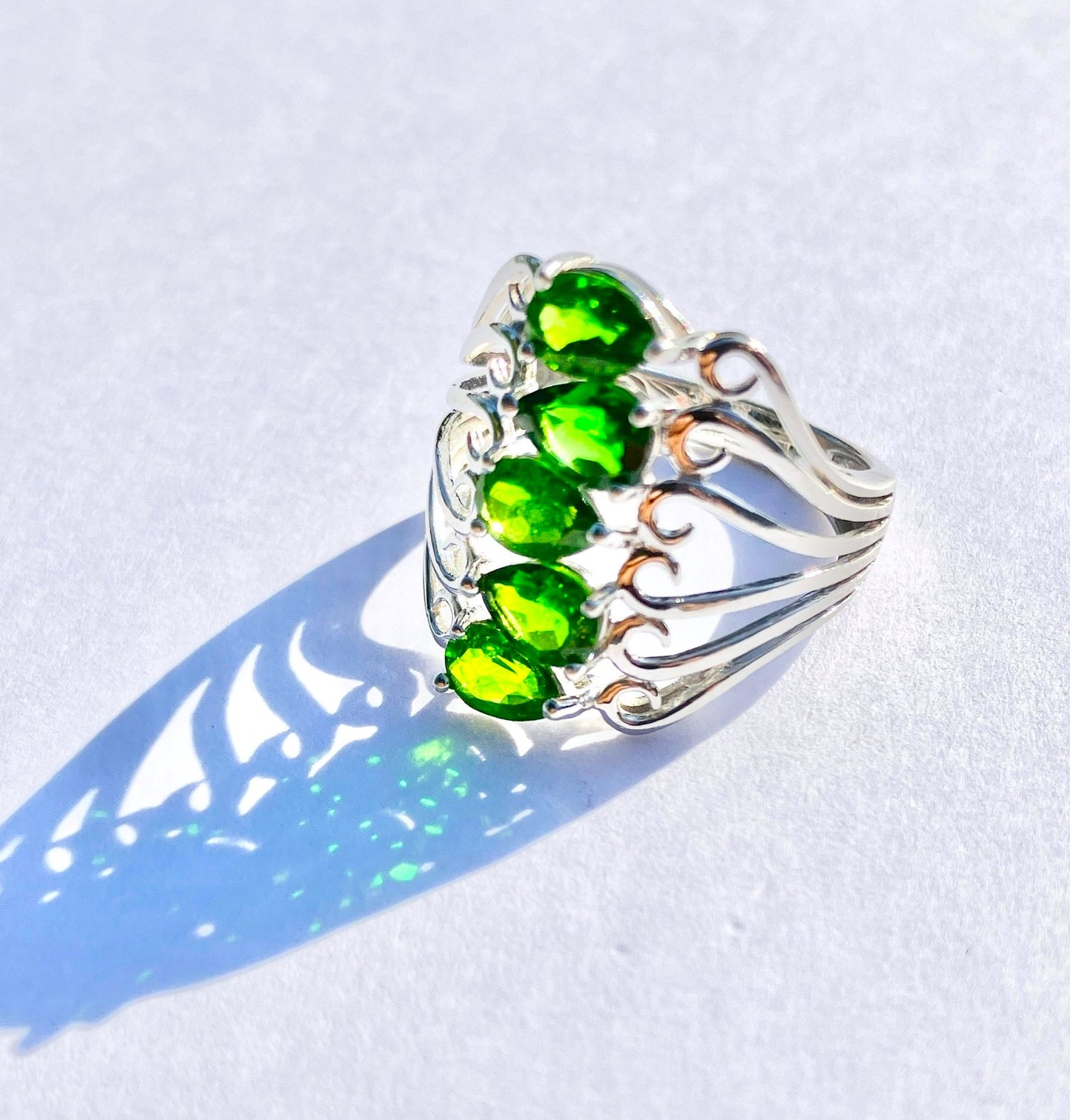 Pear Cut Chrome Diopside in Swirl Setting Ring