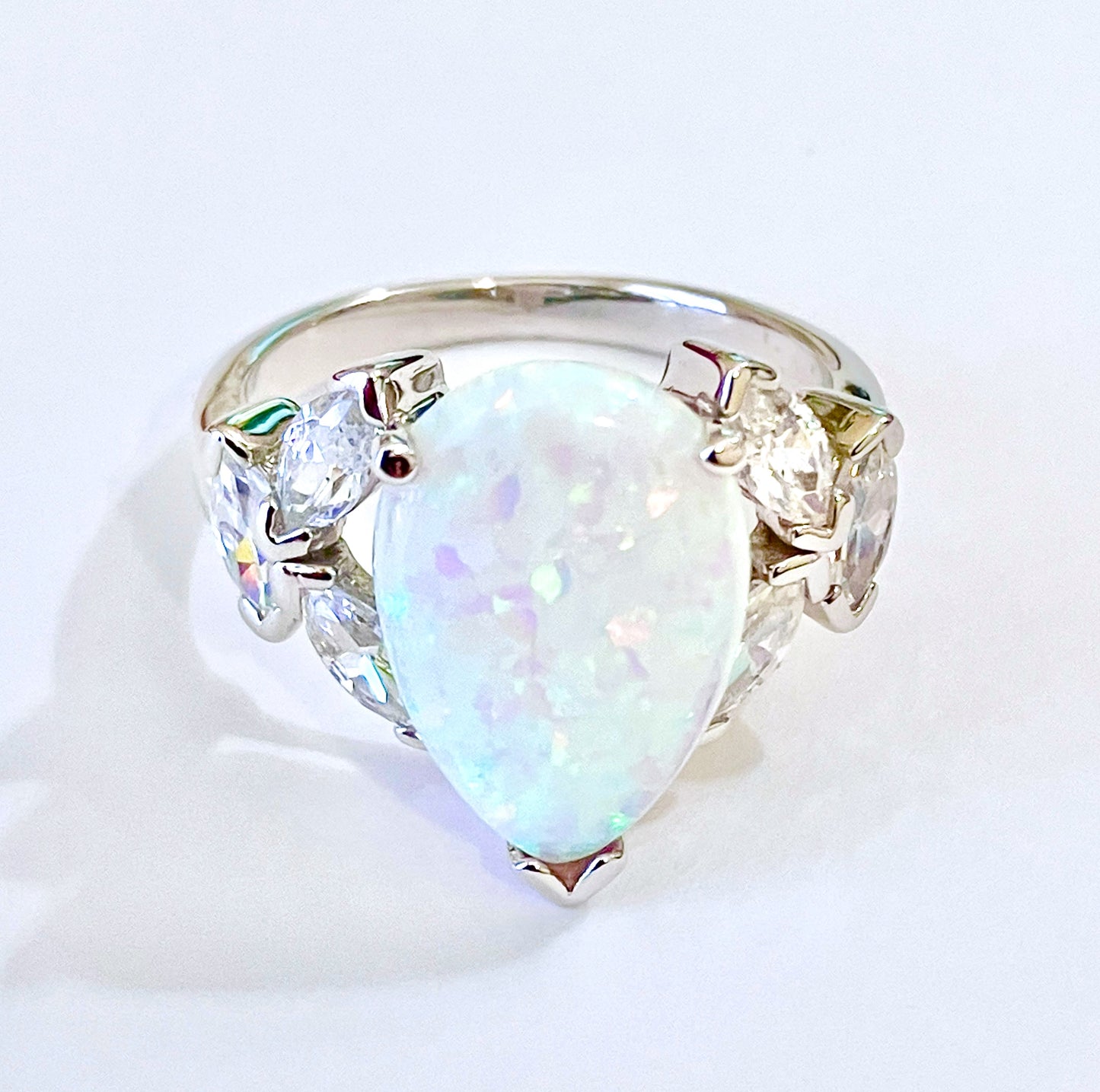 Pear Cut Synthetic Opal Ring with Marquise Cut “Diamond” Accents