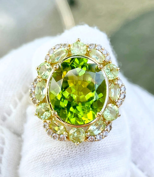 Gold Plated Oval Peridot in a Marquise and Round Cut Peridot Halo with “Diamond” Accents Ring
