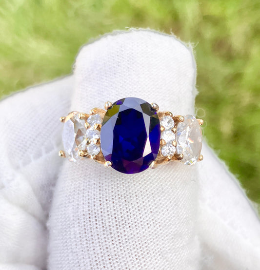 Gold Plated Oval Cut Synthetic Sapphire with “Diamond” Accents Ring