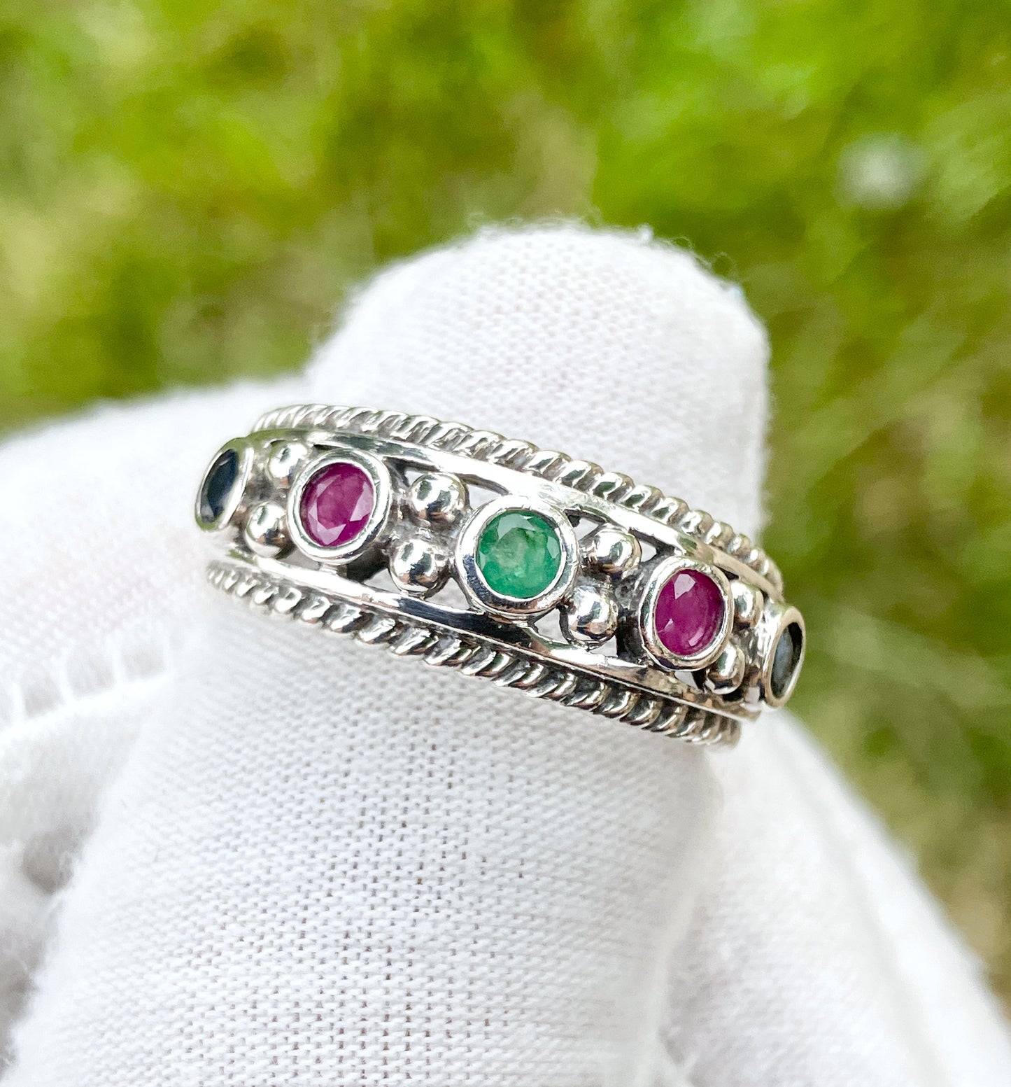 Round Cut Sapphire, Emerald, and Ruby Ring