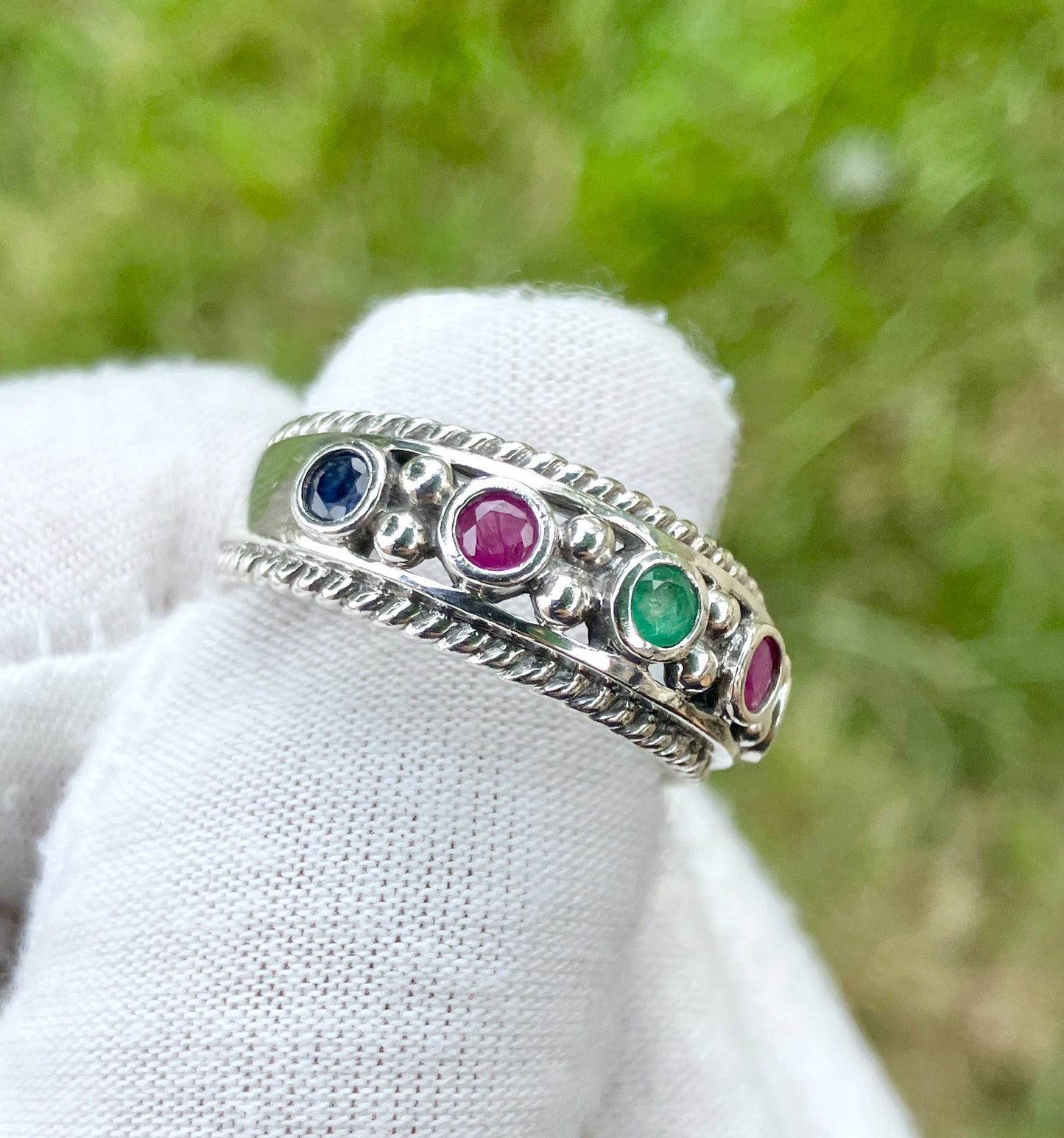 Round Cut Sapphire, Emerald, and Ruby Ring