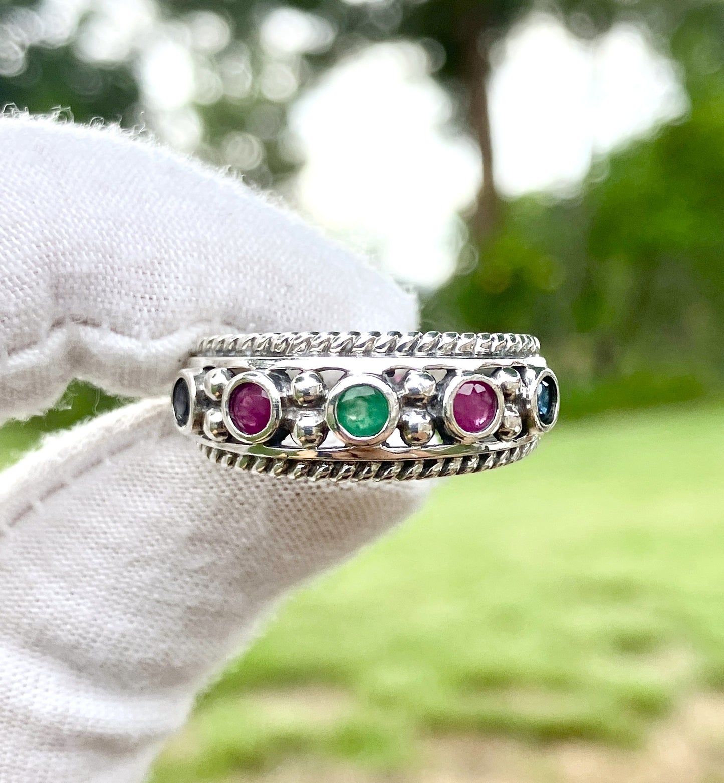 Round Cut Sapphire, Emerald, and Ruby Ring