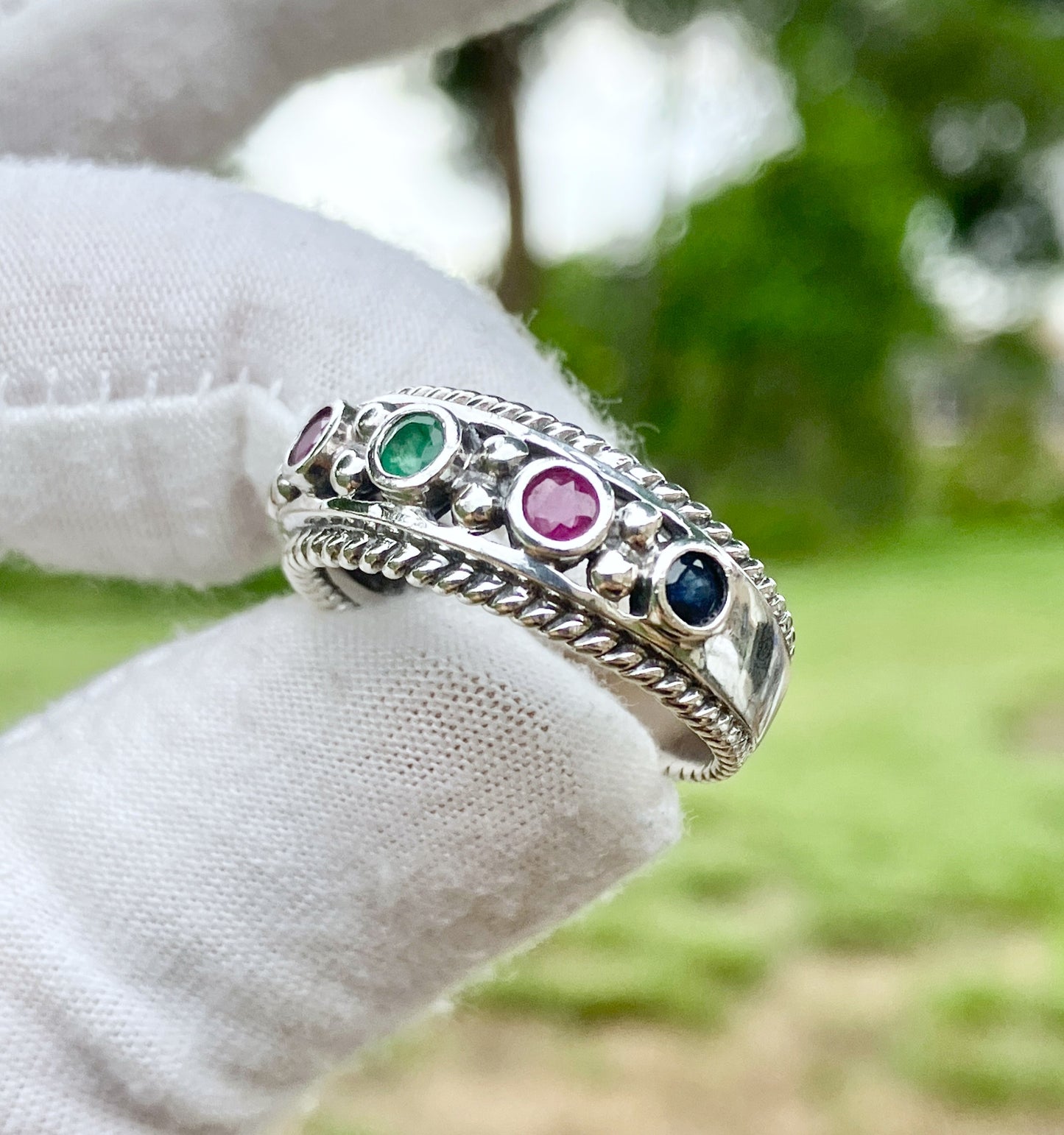 Round Cut Sapphire, Emerald, and Ruby Ring