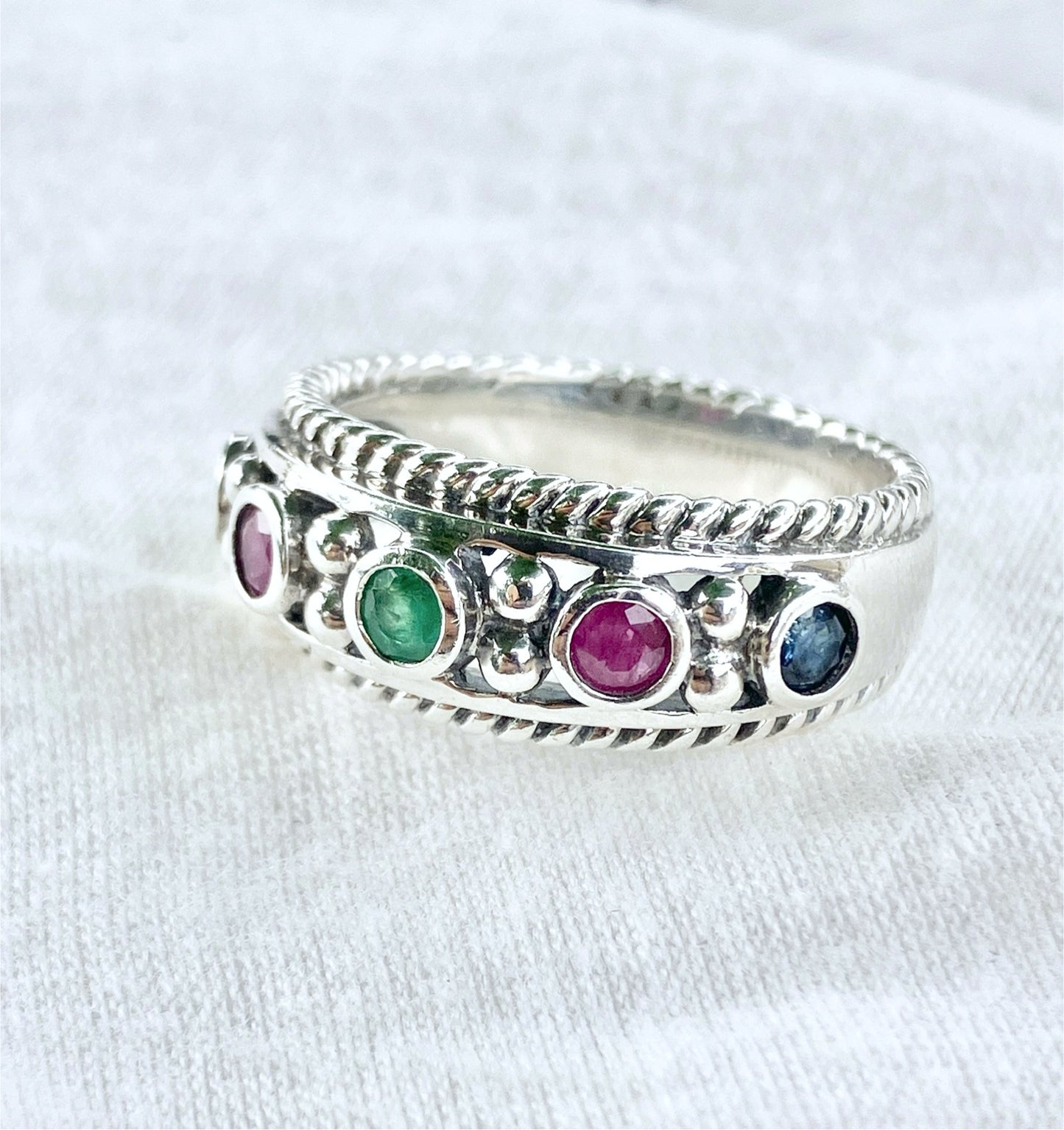 Round Cut Sapphire, Emerald, and Ruby Ring