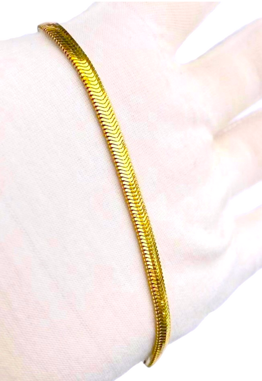 Pulsera de hueso de serpiente chapada en oro