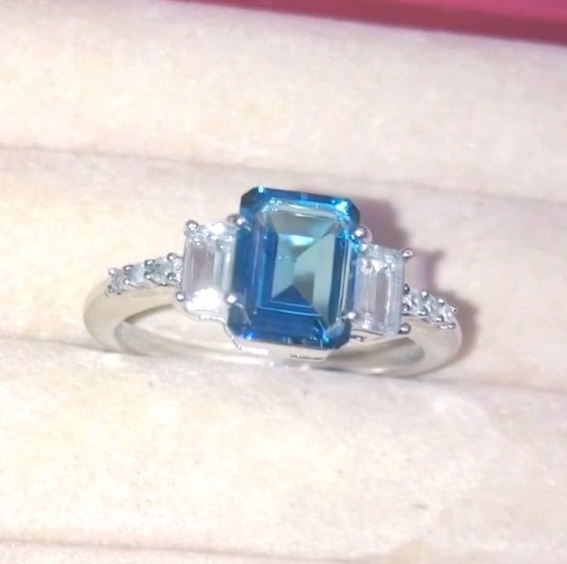 Emerald Cut London Blue and Colorless Topaz Ring with “Diamond” Accents