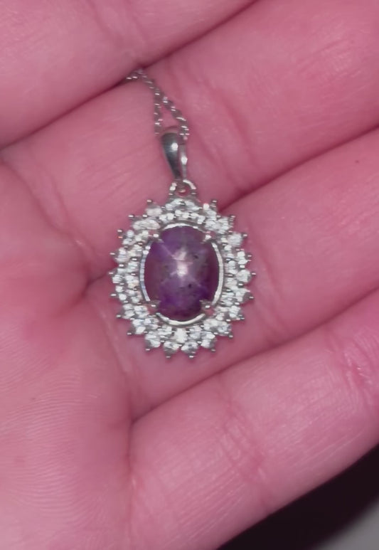 Oval Star Ruby in Halo Necklace